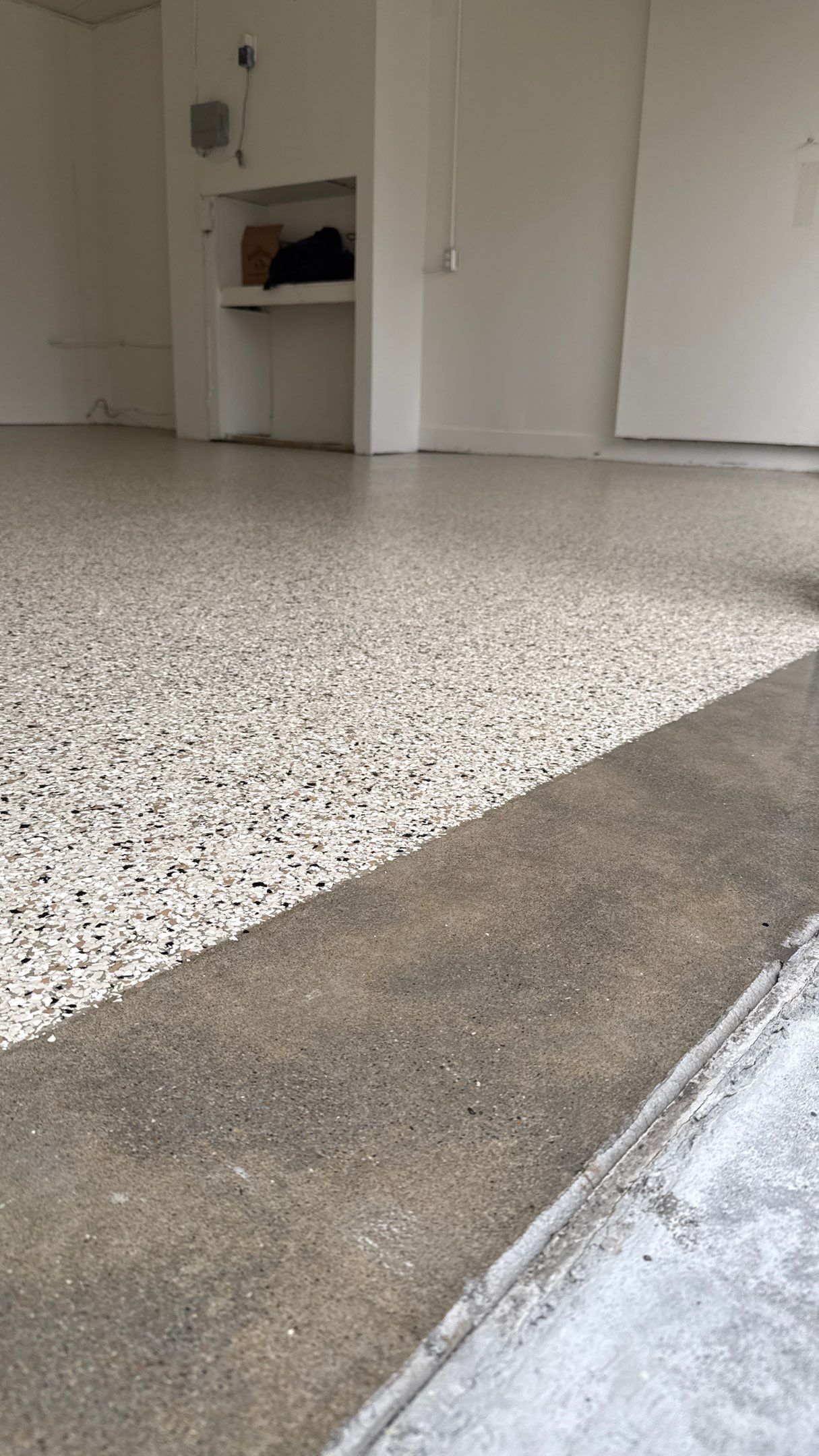 Check Out This Beautiful Shoreline Flake Floor  by Banner Garage
