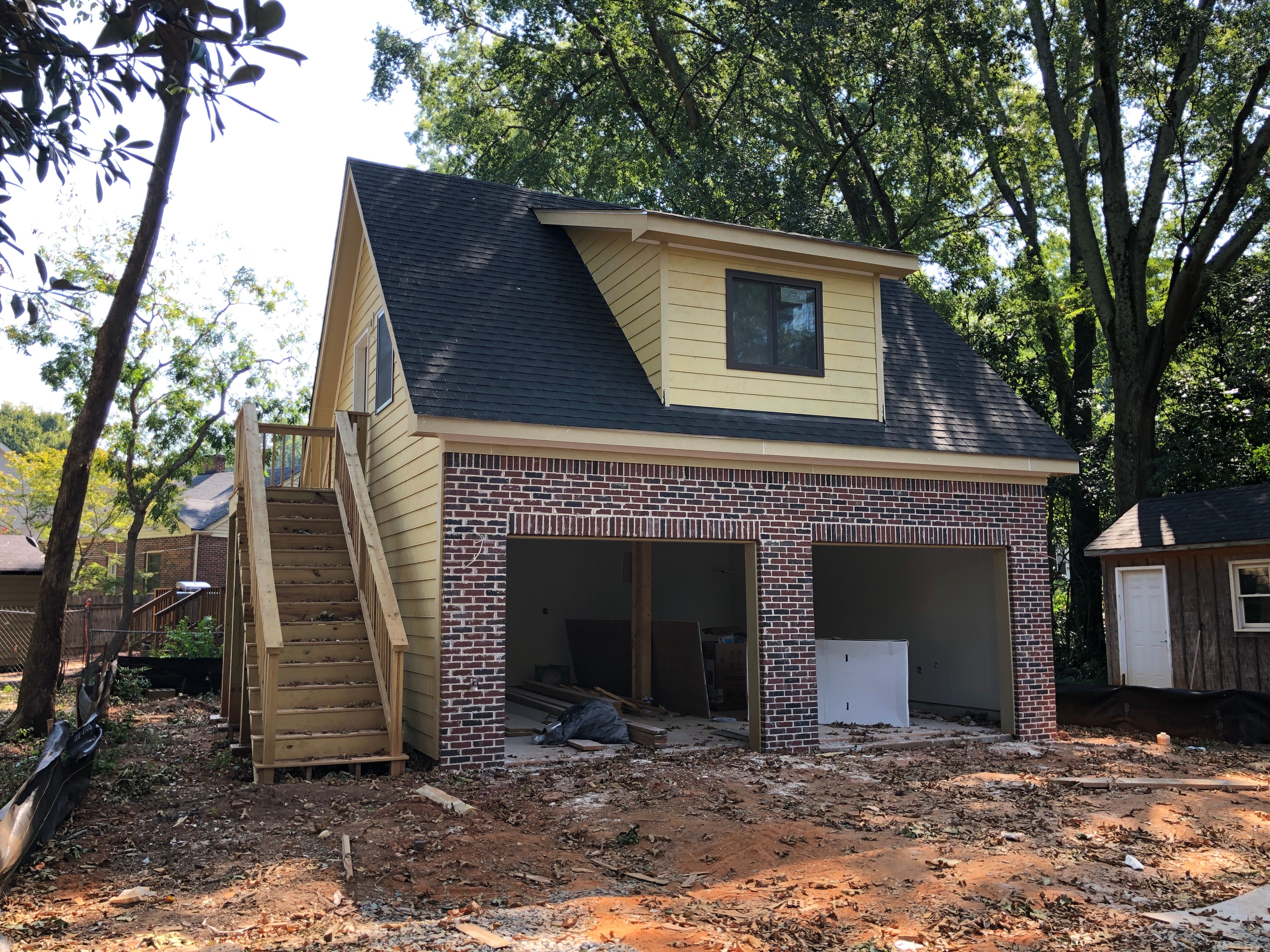 Custom Two-Story Brick Garage and Studio Apartment in Decatur by Swift Home Renovations 