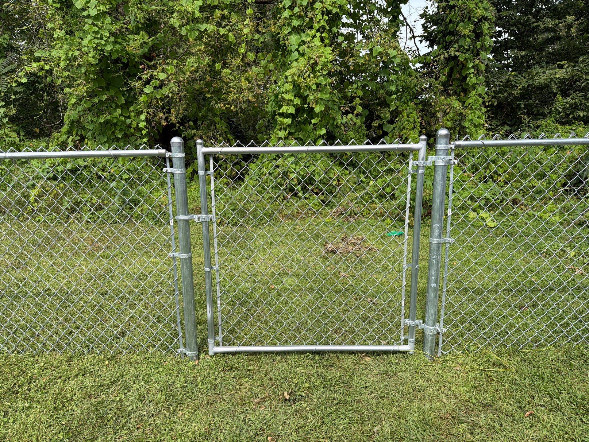 Galvanized Chain Link Fence and Gate Installation in La Porte City by Perfect Picket Fence and Stain