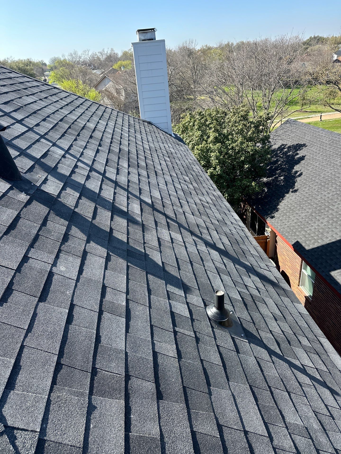 Residential Roofing Installation using Malarkey Vista Class 3 Matte Black by DeZign Roofing & Exteriors