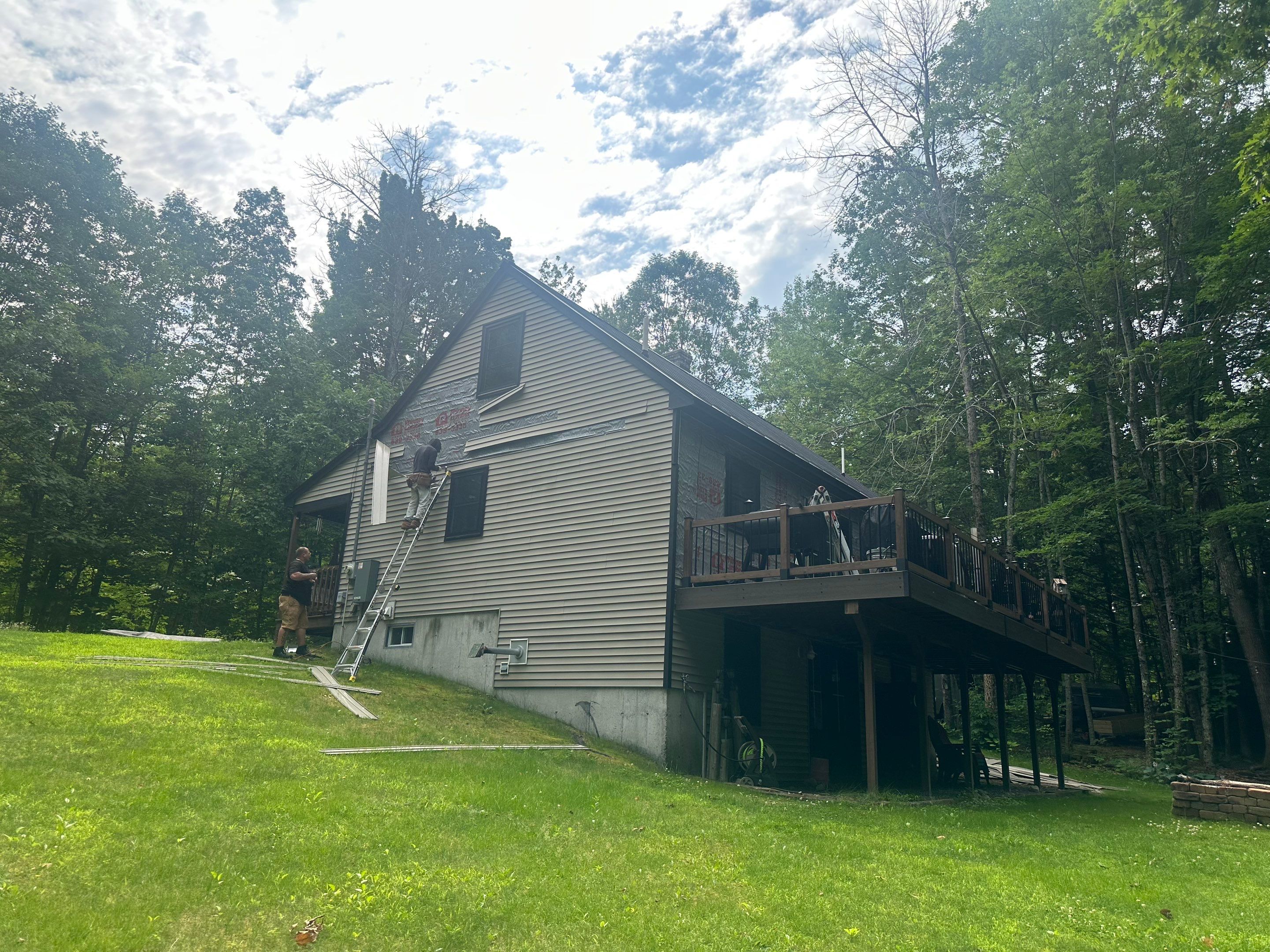 Sage Green Board and Batten Siding and Deck Upgrade in Standish by Tall pine roofing