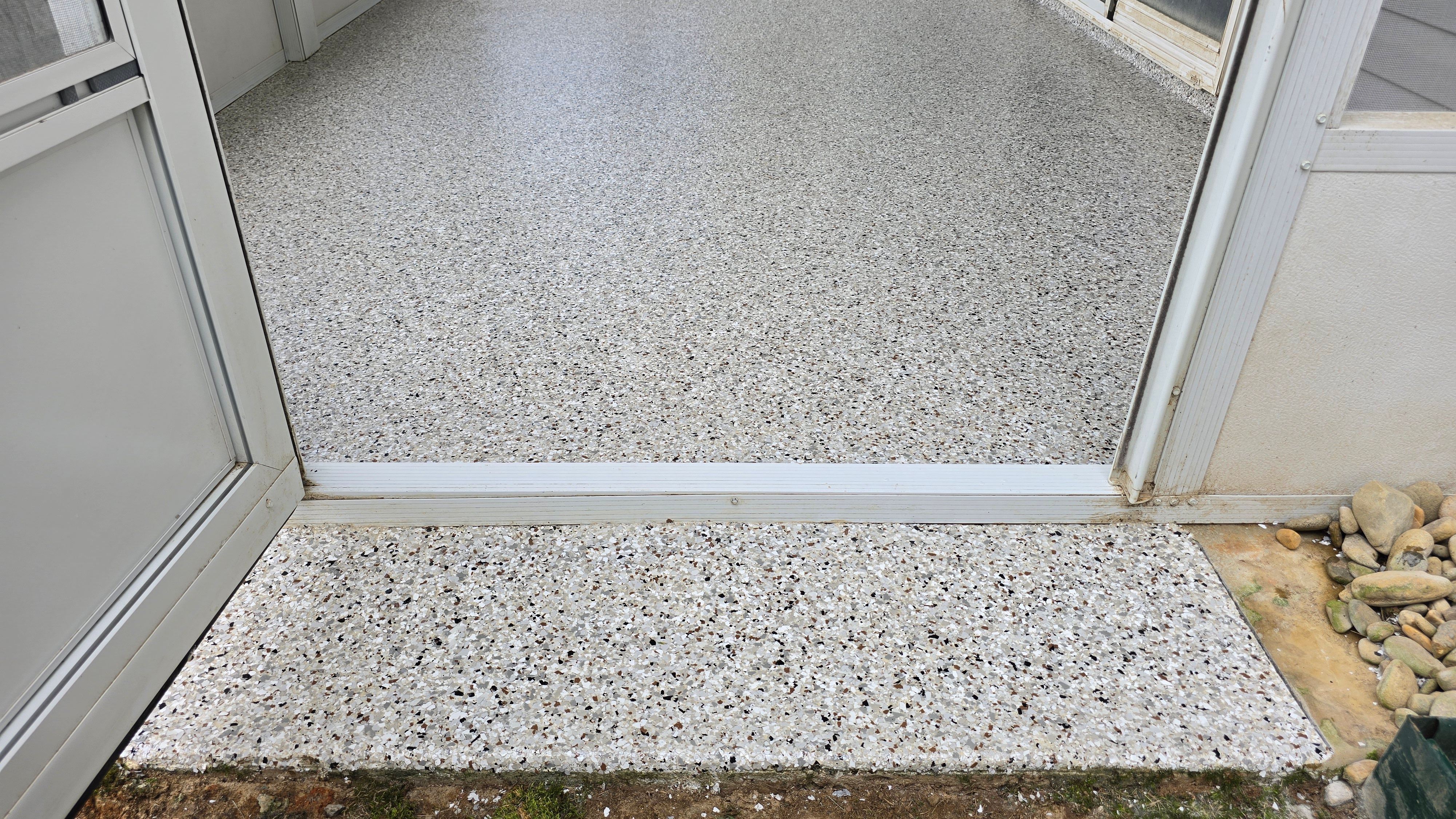 Garage & Back Porch Using Shoreline & Coyote by Elite Floor Solutions