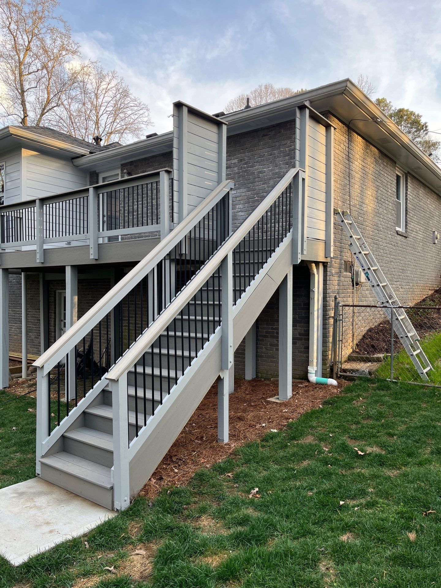 James Hardie Siding Replacement, Trex Railing Install, Exterior Painting, and Staining in Stone Mountain, GA by Nelson Exteriors 