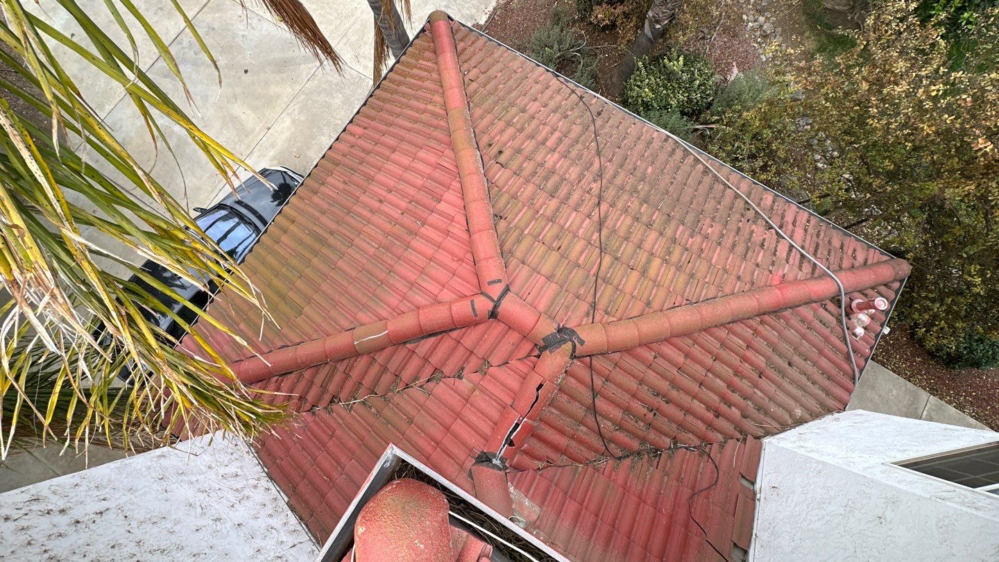 Tile refurbish project using existing tiles and replaced underlayment and battens by Straight Edge Roofing Inc