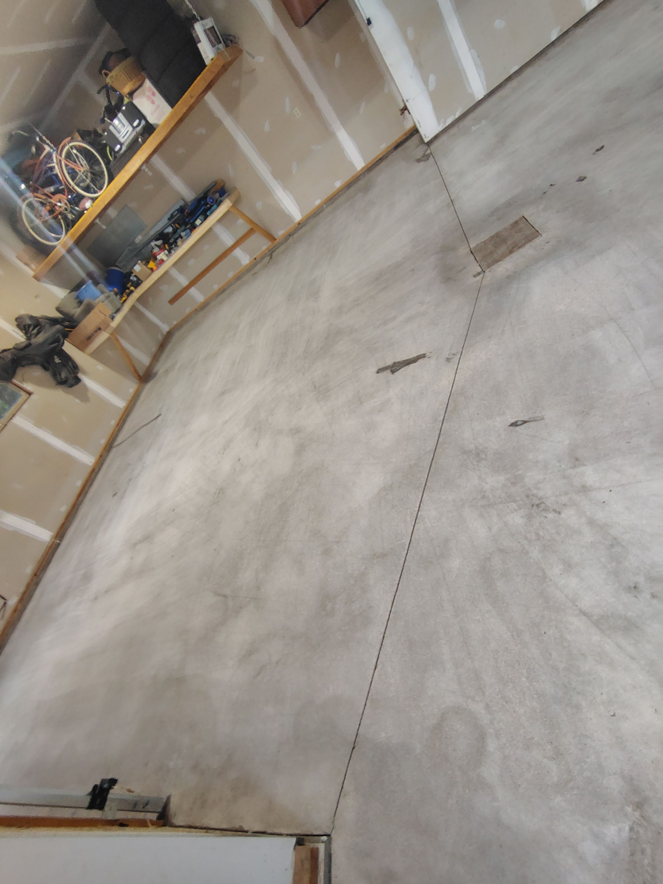 Sioux Falls Garage Concrete Grinding and Nightfall Decorative Chip Coating by Select Painting, Coatings & Garage Cabinets