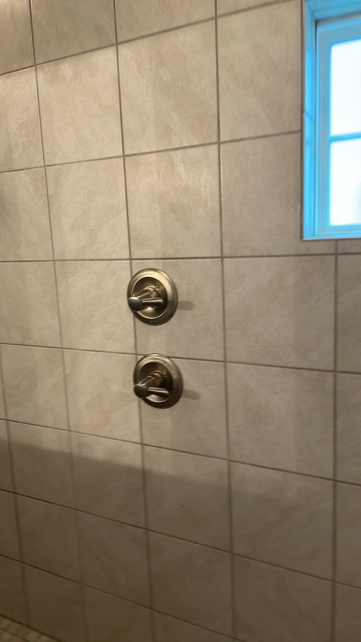 Bathroom Remodel using Decorative Tile by Footprints Floors of Coastal Carolina