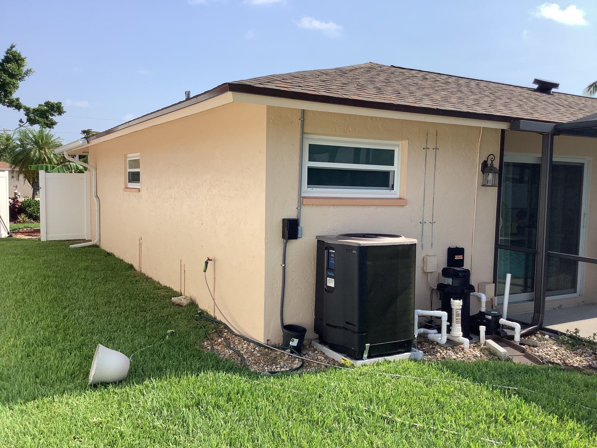 White K Style Seamless Gutters using 3X4 Elbow Downspout in Cape Coral FL by Gutter Professors