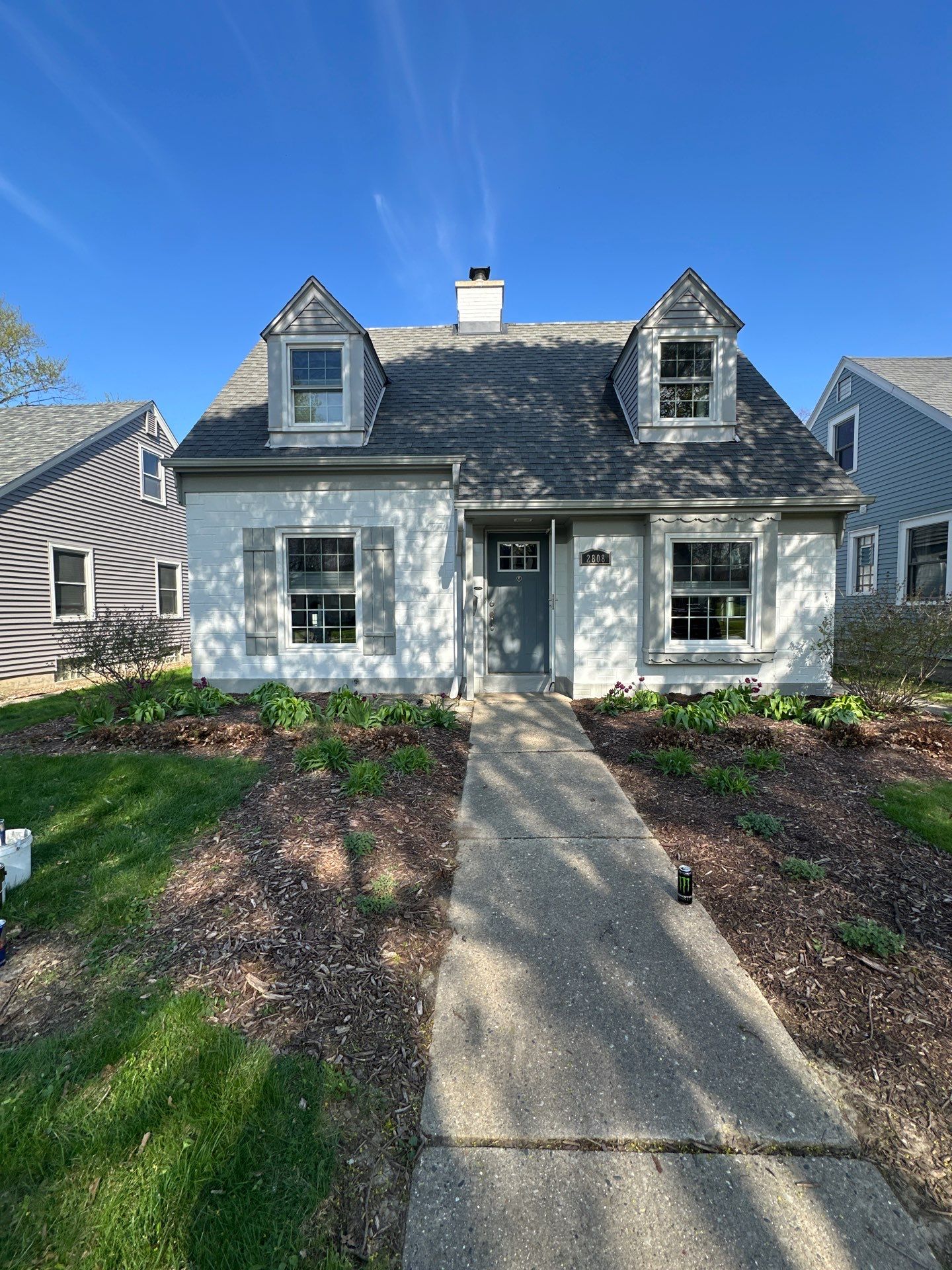 Milwaukee Cape Cod Exterior Renovation and Siding Replacement by OCS Contracting Services