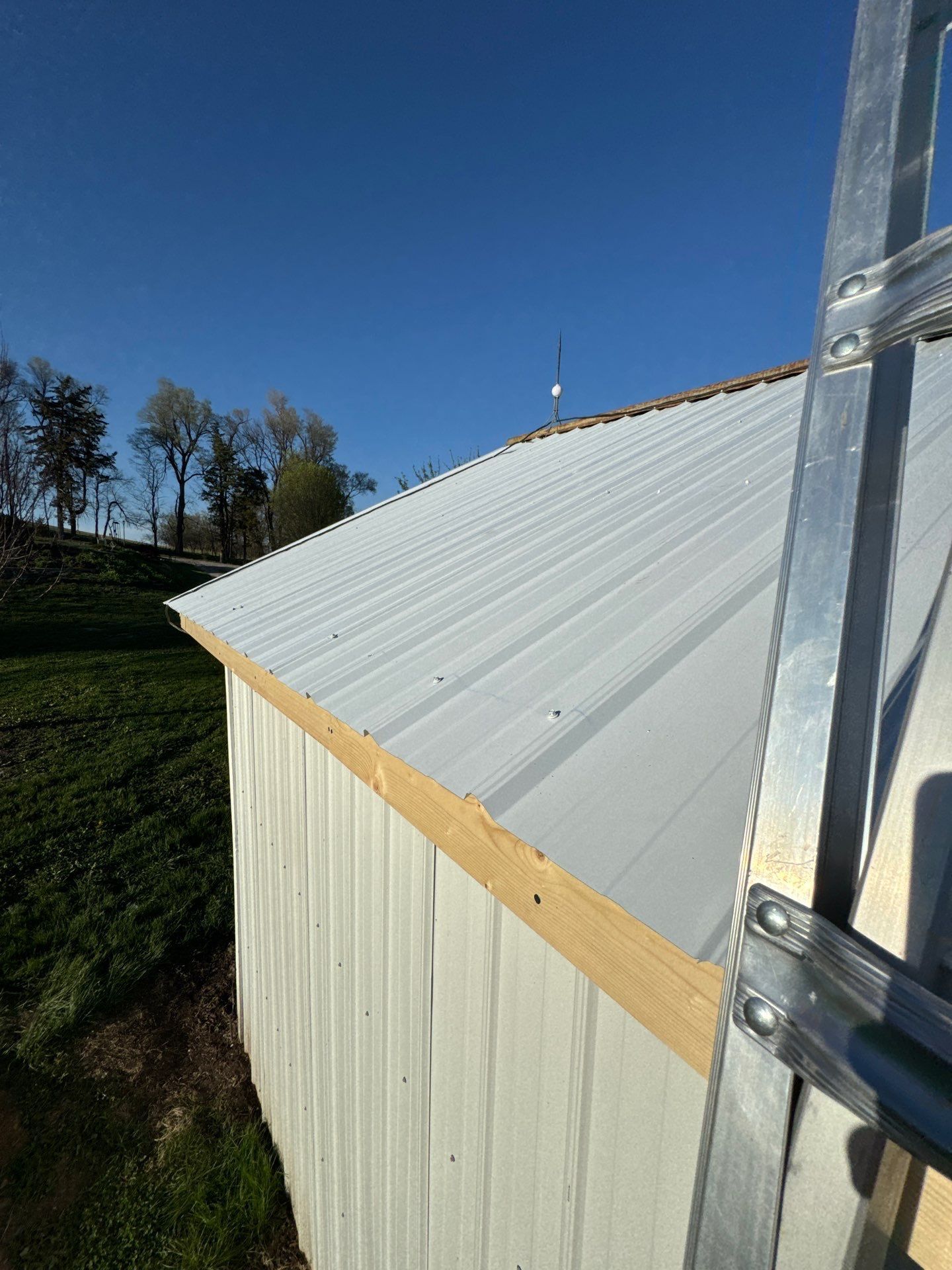 Ribbed Metal Roof Replacement on Outbuilding in Hooper, NE by Crows Roofing LLC