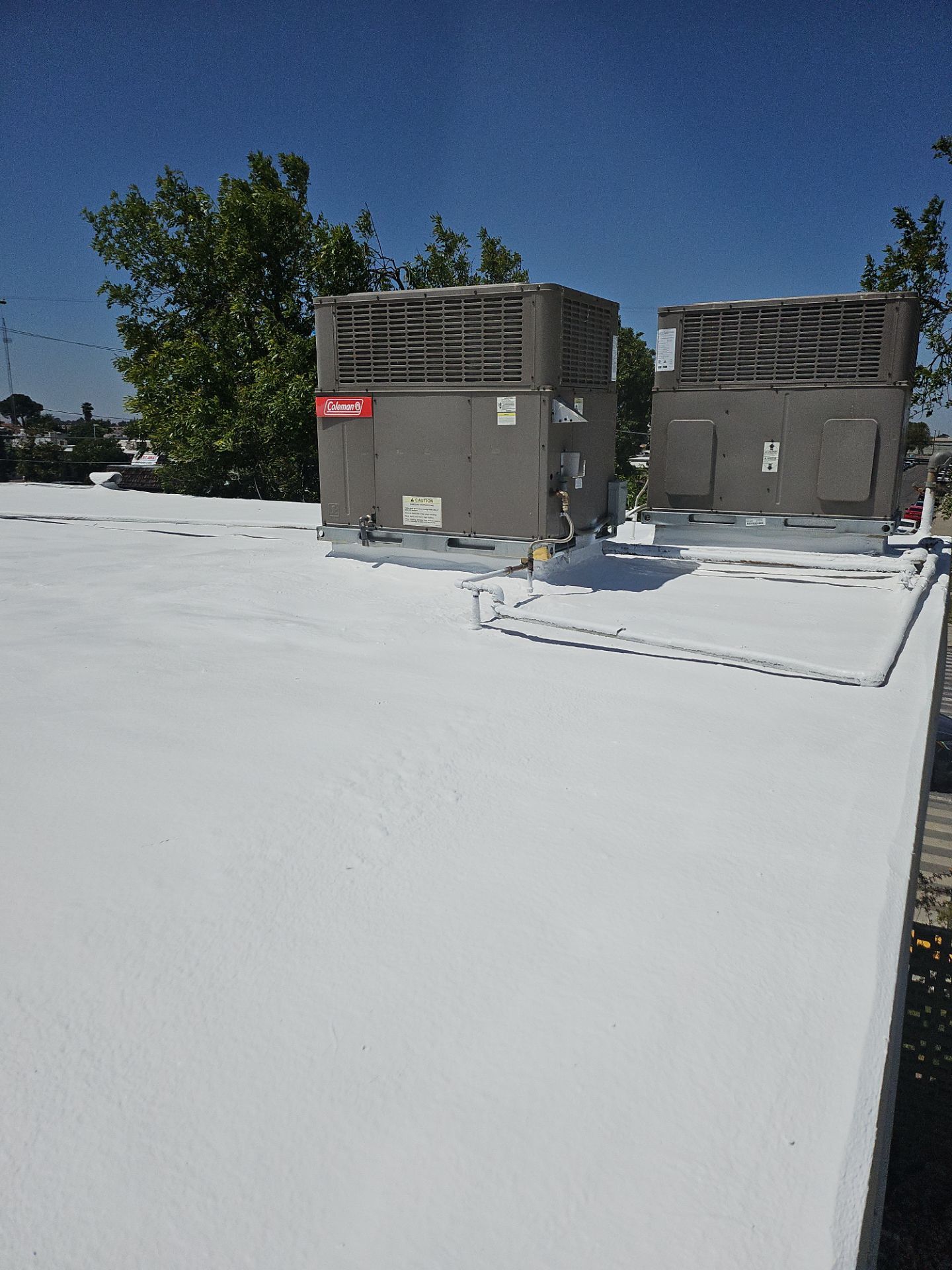 Foam Refurbish using General Coatings acrylic coatings and spray foam by Straight Edge Roofing Inc