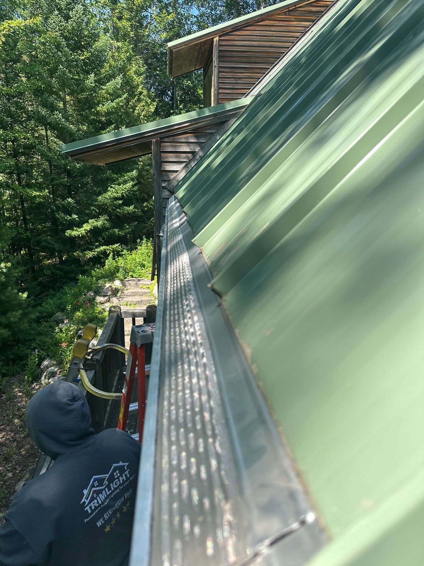 Central Lake Residential Gutter and Gutter Guard Installation by Rainbow Seamless Systems