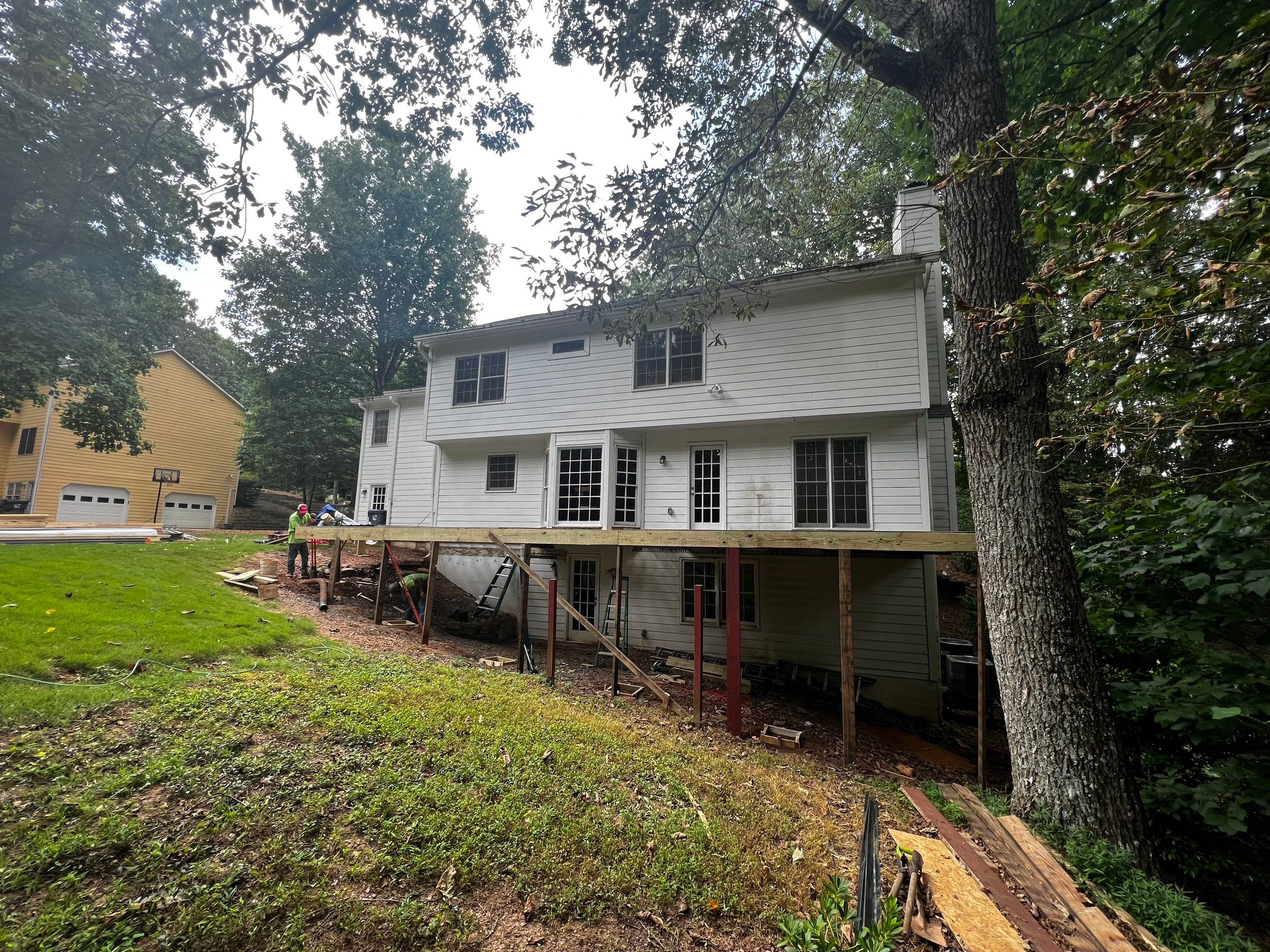 Elevated Composite Deck and Screened Porch Construction in Duluth by Swift Home Renovations 