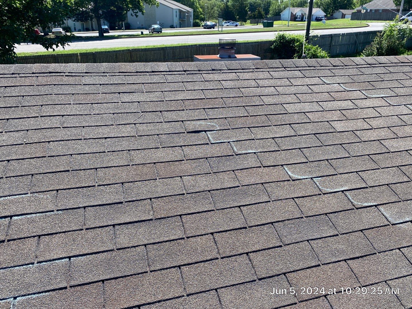 Roof inspection in Bartlesville by Decor Roofing & Restoration