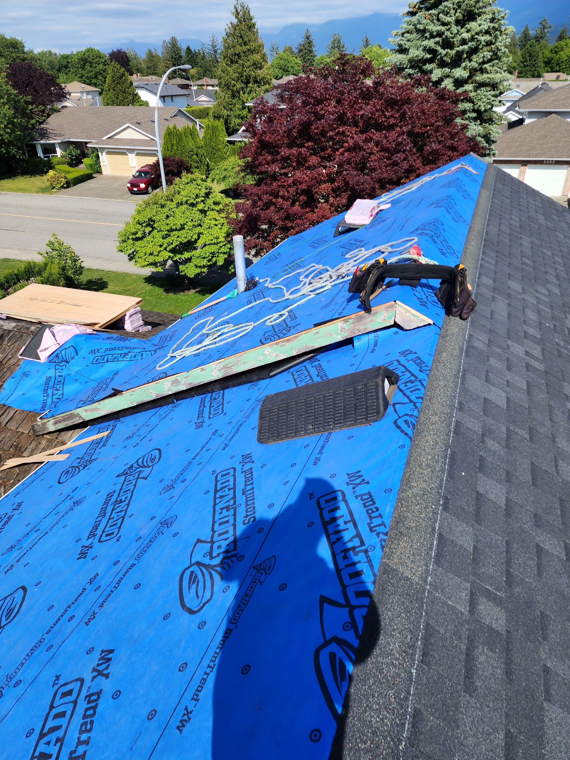 Residential Cedar ReRoofing Installation using OC Oakridge shingles by Top Notch Roofing Inc