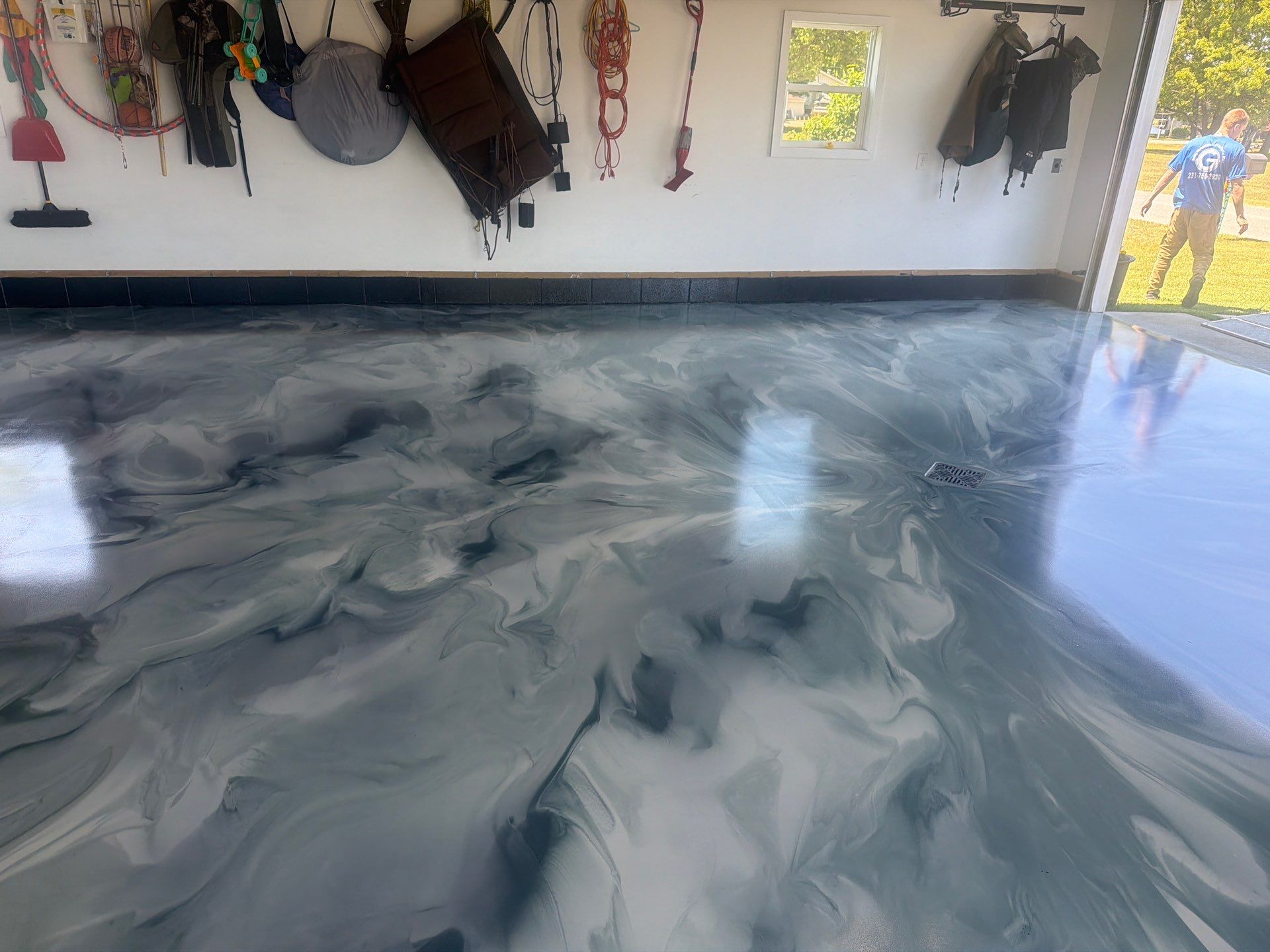 Custom Metallic Epoxy Floor and Polished Countertop Installation in Mears by Gordon Painting