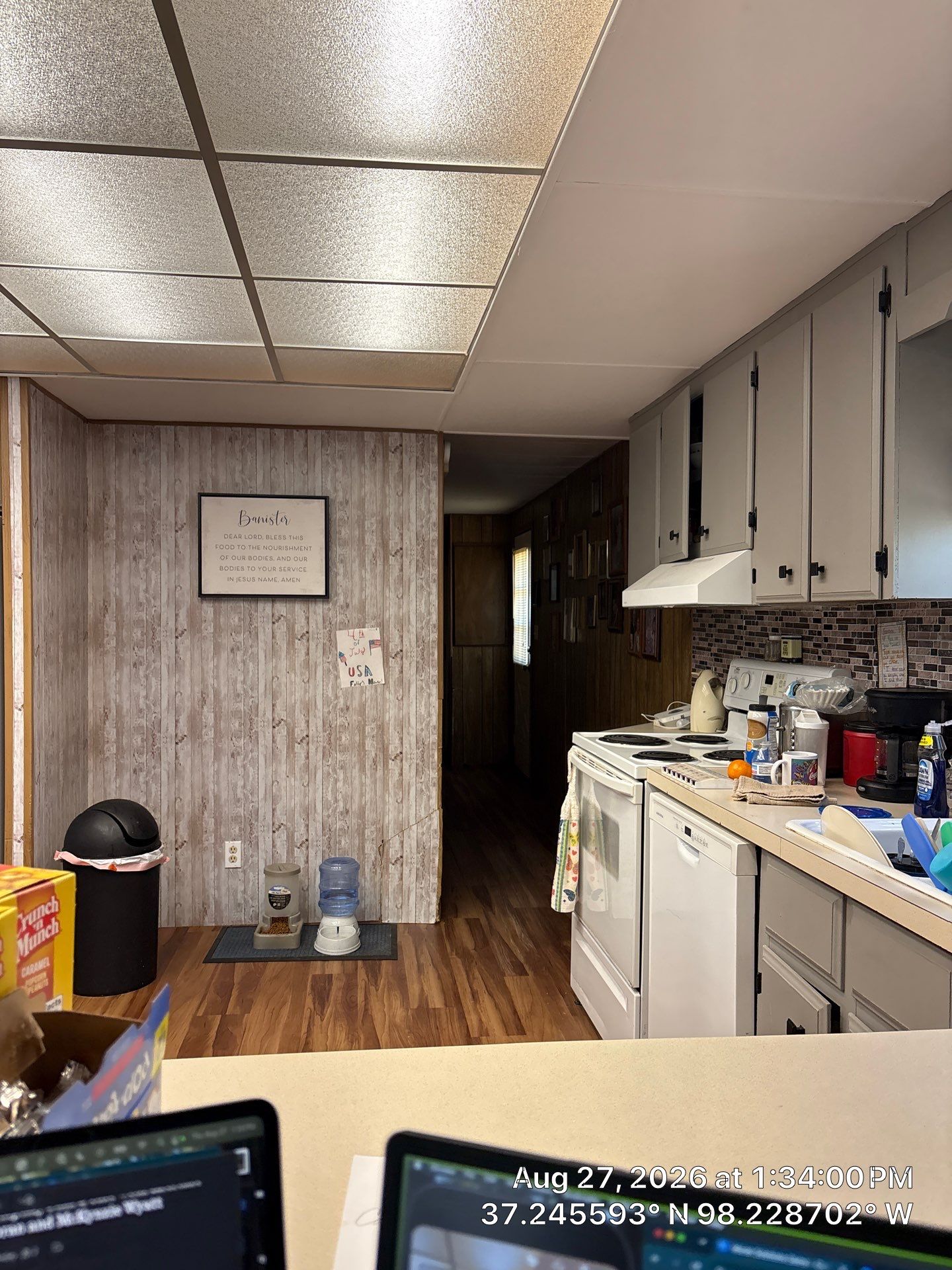 Attica Kitchen Remodel With Grey Cabinets and Mosaic Backsplash by CompanyCam Sales Demo