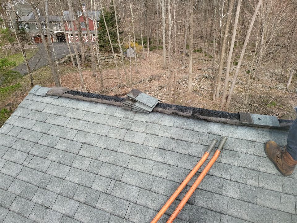 Residential Roofing Installation using onyx black by A Plus Exterior