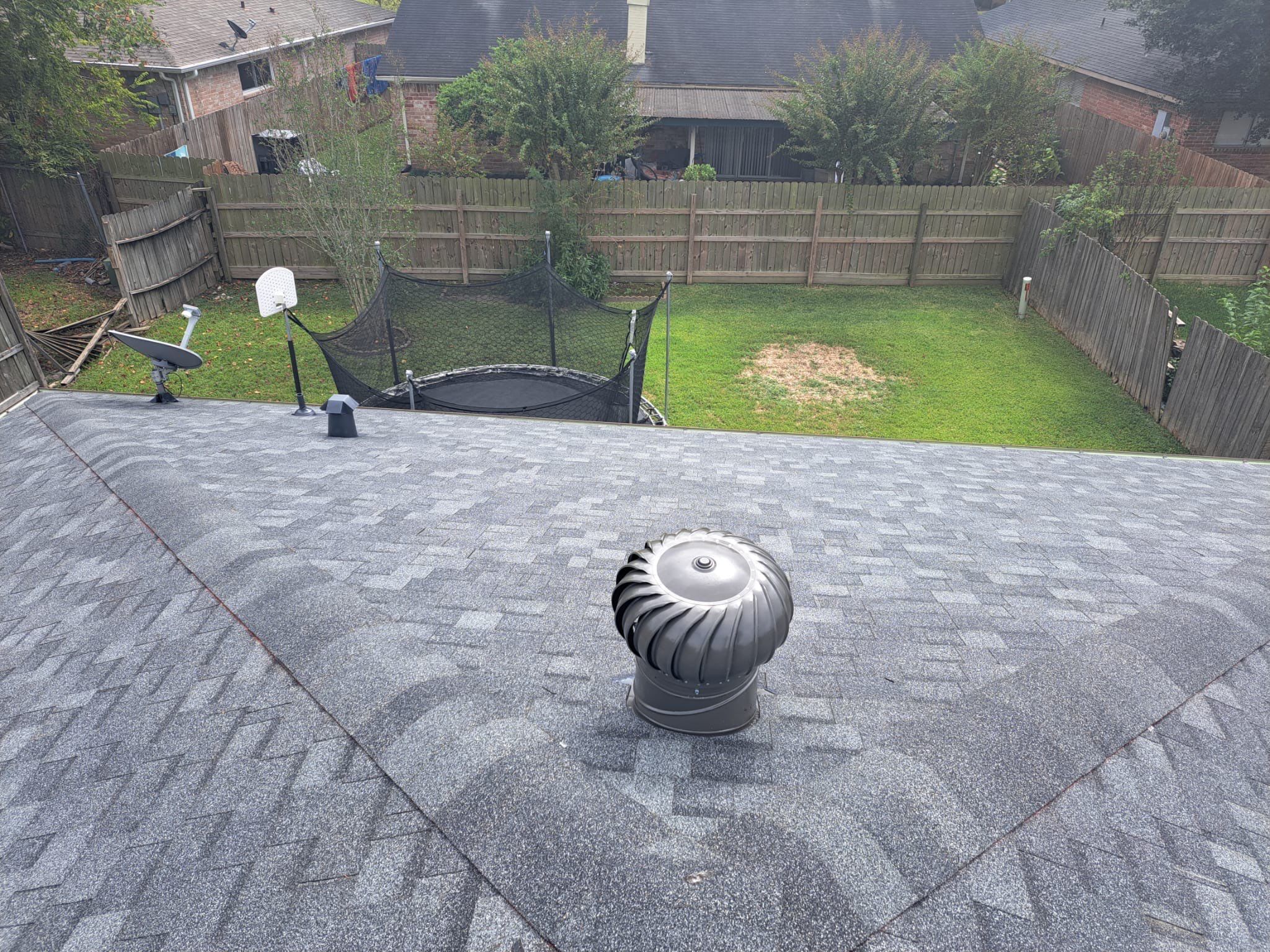 New Gray Shingle Roof on Brick Home — Houston, TX by PL Roofing & SB Roofing, LLC.