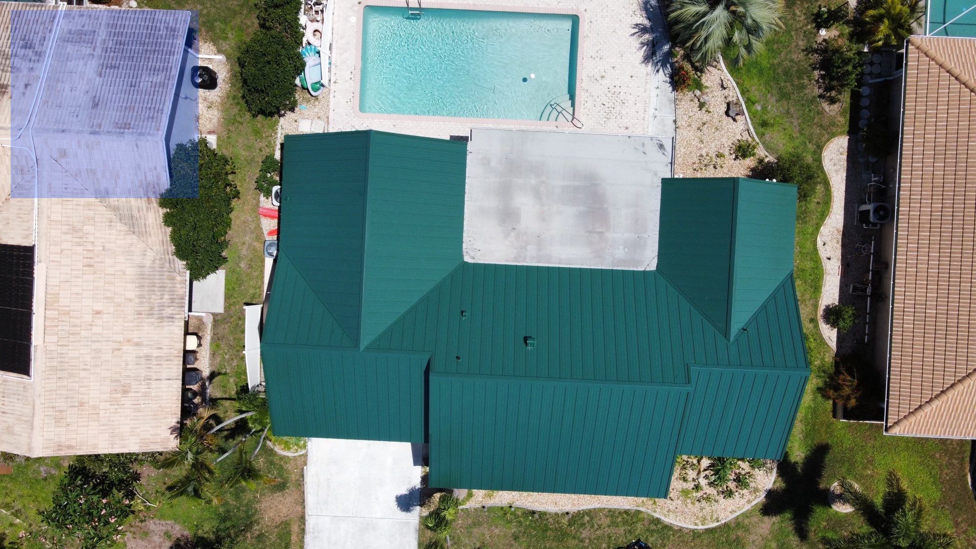 Residential Roofing Installation using Gulf Coast Metals Gulf Seam Panels by Four Peaks Roofing
