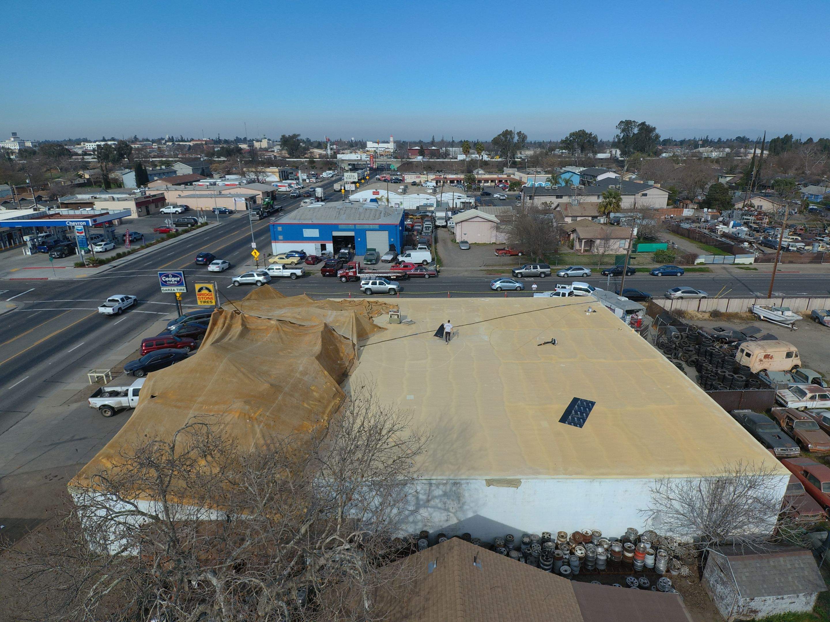 Spray foam and coatings using Conklin Benchmark/PUMA XL coatings and spray foam by Straight Edge Roofing Inc