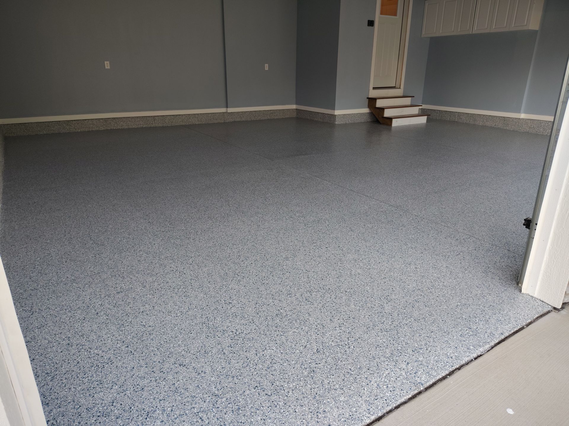 Tidal Wave Garage Transformation in Adel, Iowa by Revival Concrete Coatings