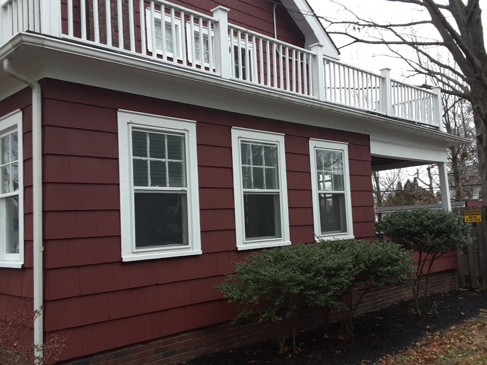 Residential Roof Replacement using Patio Roof by Absolute Roofing and Construction