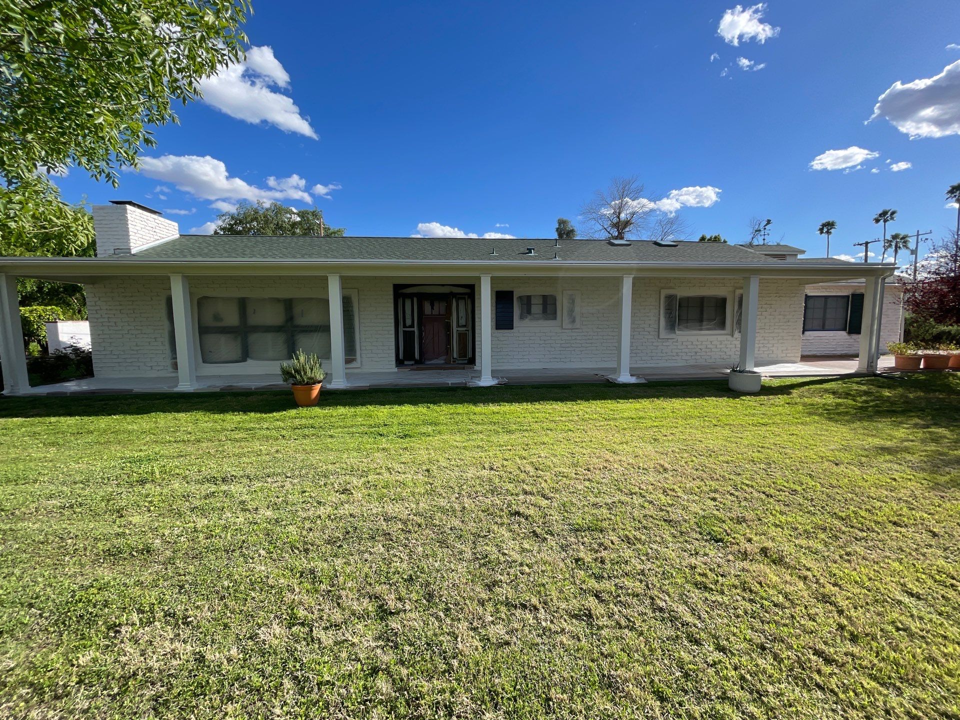 Wagon Wheel - A Stunning Home Exterior Makeover with Dunn Edwards Paints in Phoenix, AZ by Double G Painting Contractors, LLC
