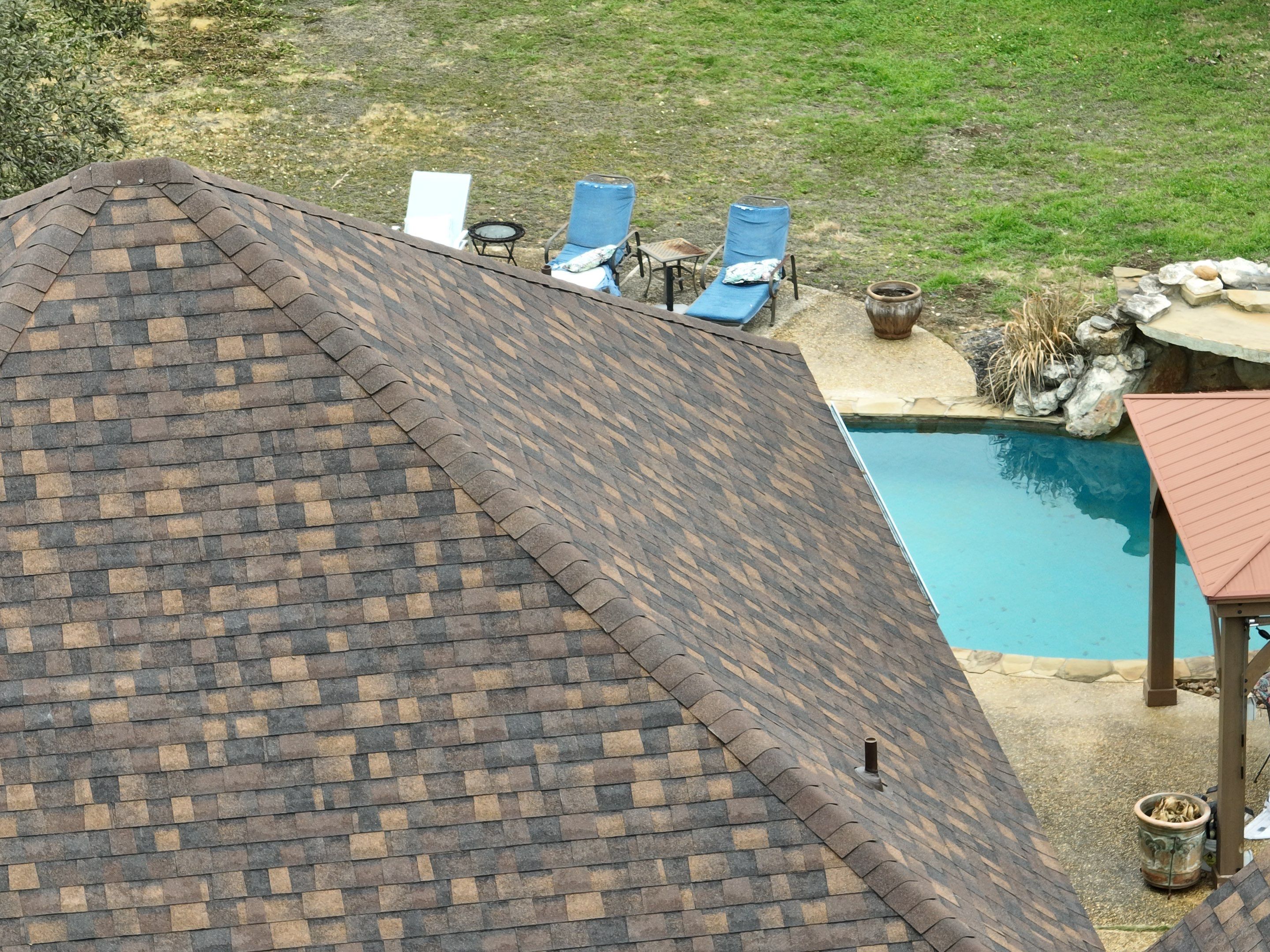 Residential Roof Replacement using 30 Year Laminate Shingles with High Profile Ridge by Premier Roofing and Contracting