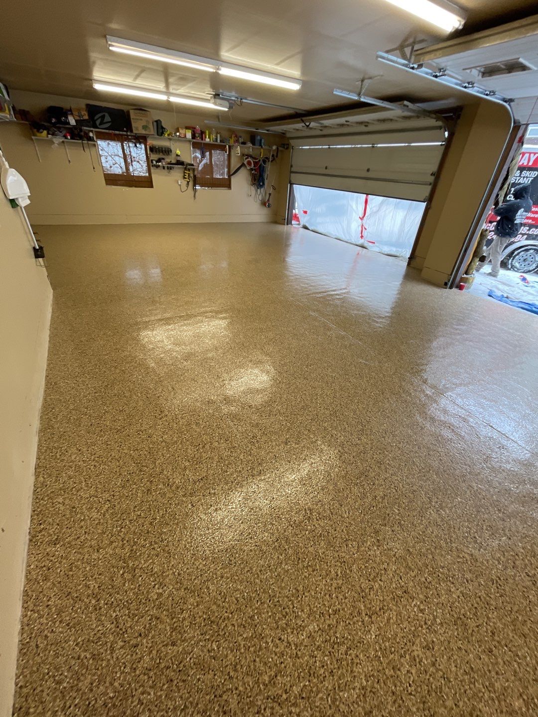 Garage Transformation using Sandstone by Croc Coatings, LLC