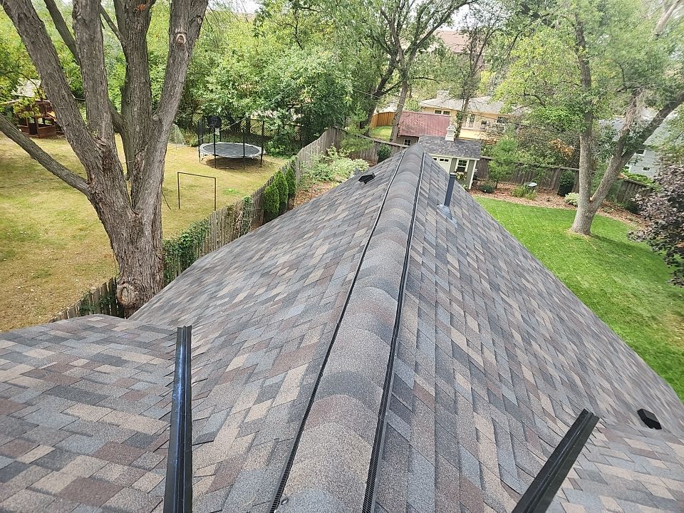 Storm Restoration – Roof, Gutters & Gutter Guards | Golden Valley, MN by First Impressions Exteriors