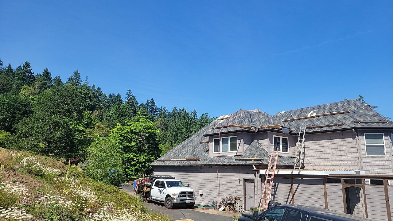 Residential Roofing Installation using Malarkey Windsor 50 Year Shingle (Color: Storm Grey) by Orezona Building & Roofing Company, Inc.