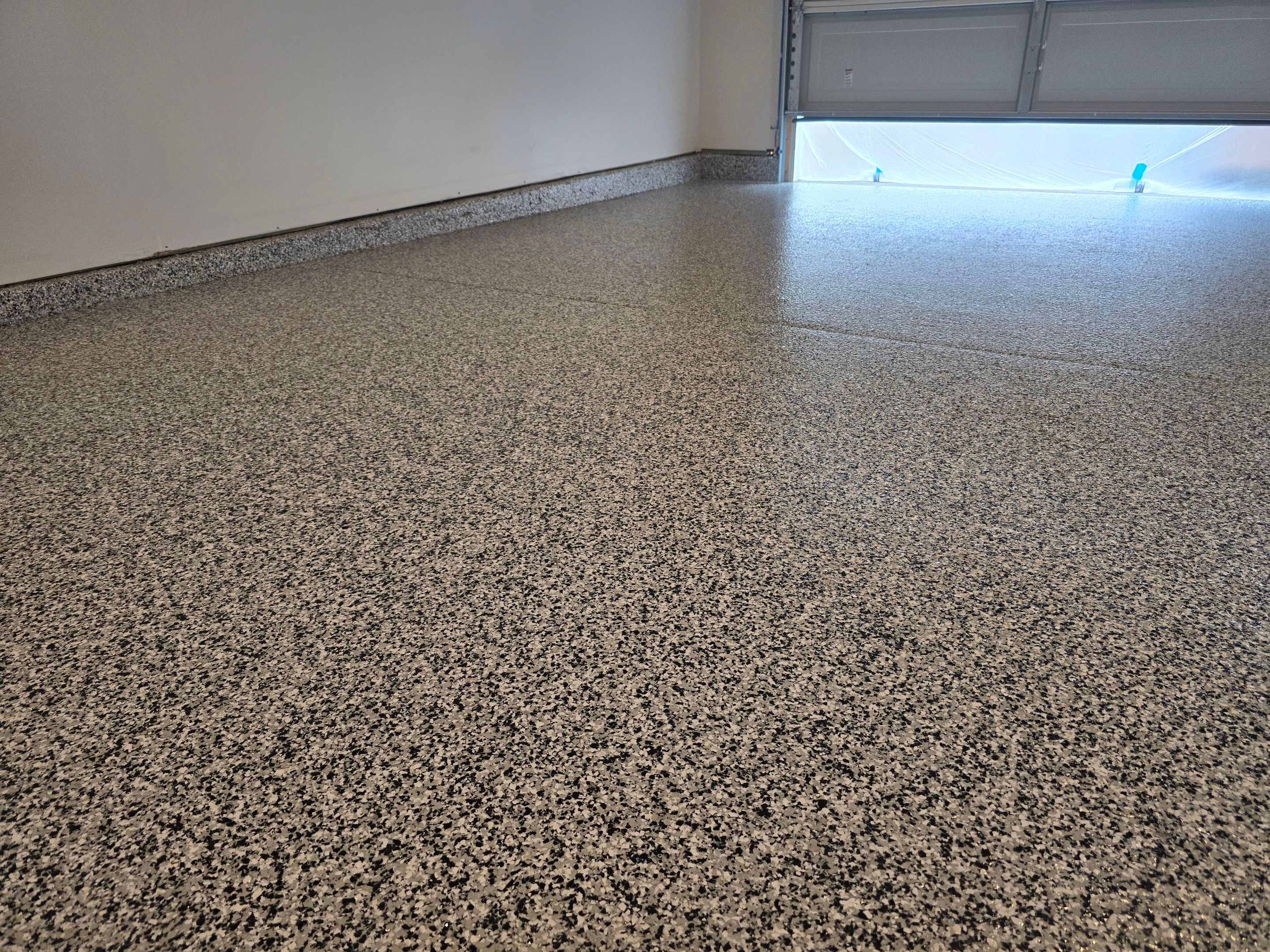 Garage using Domino by Elite Floor Solutions