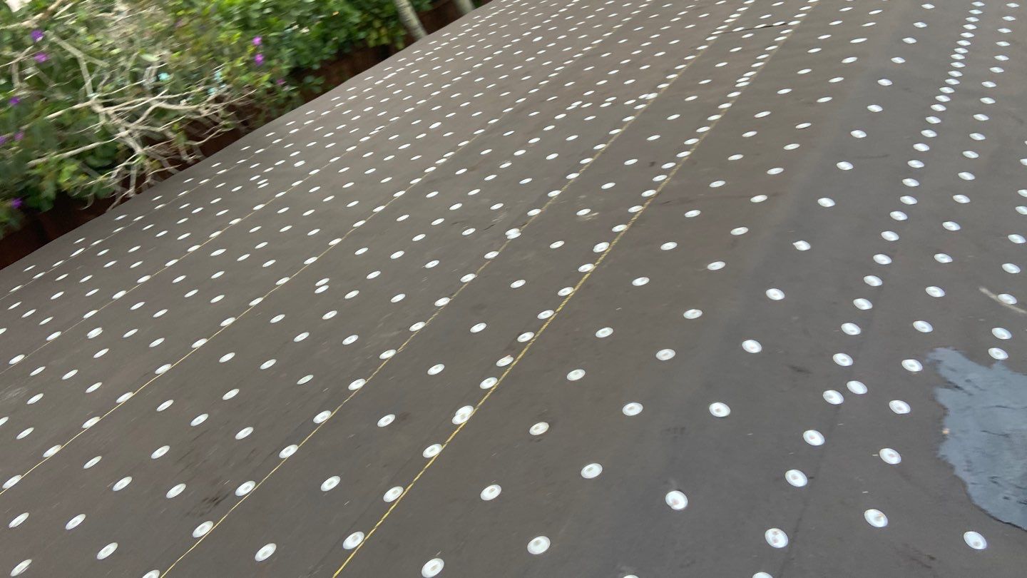 Residential Roofing Installation using 1" Nail strip metal roof by BLUES BROTHERS CONSTRUCTION CORP