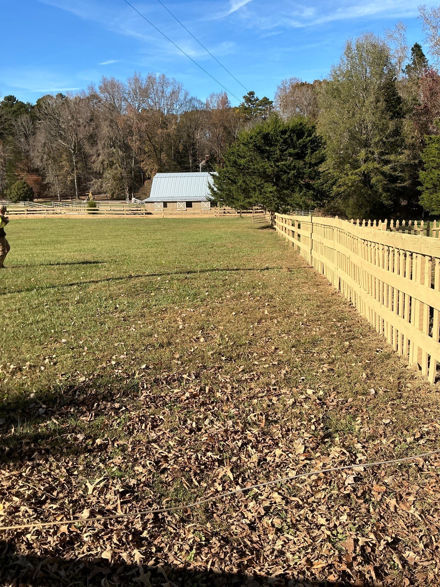 Fence Staining (Farm in Durham NC) by GonzalezPainters & Contractors Inc 