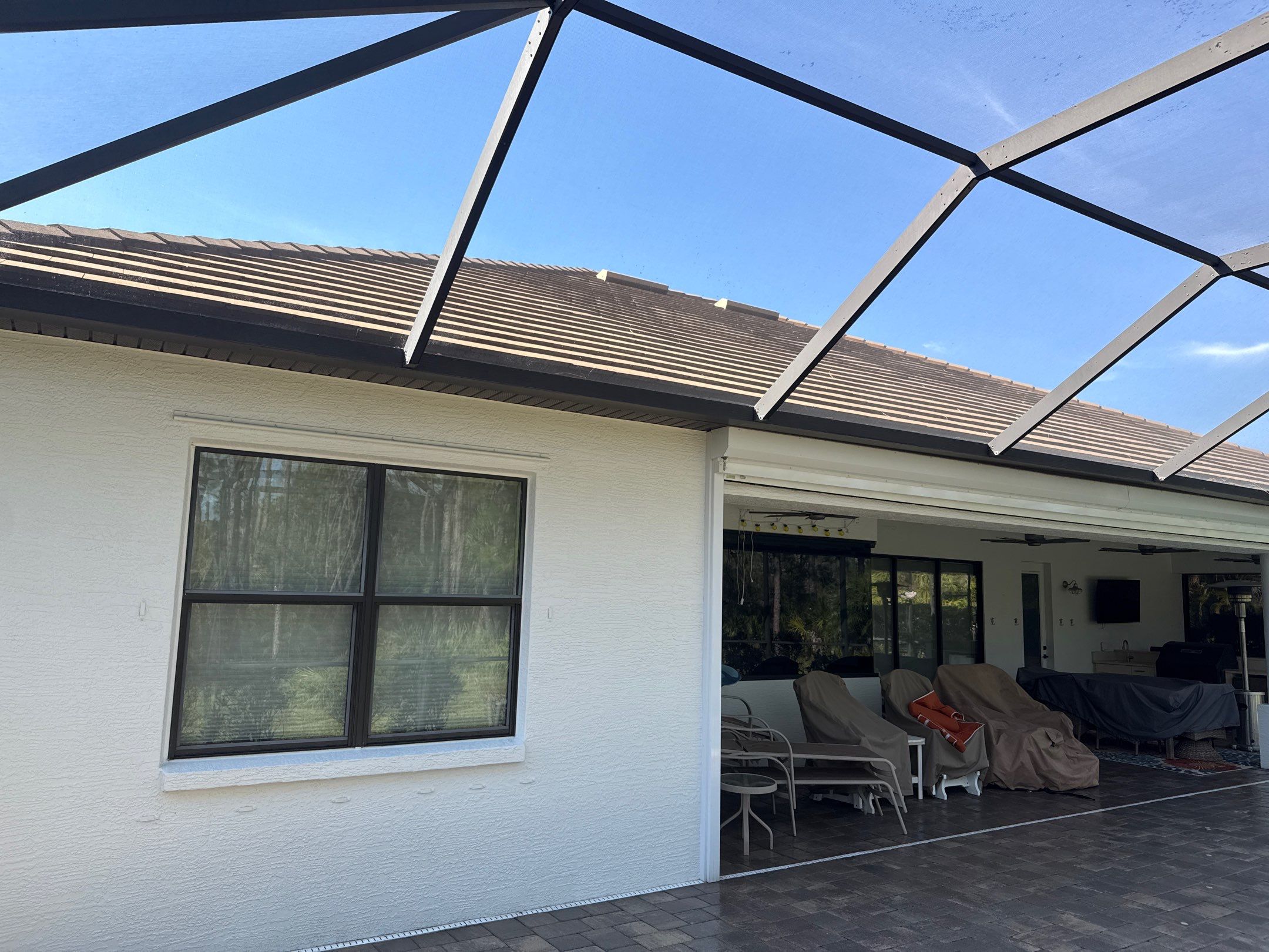 Flat Tile Roof, Paver Pool Deck & Driveway Cleaning | Cove at Twin Rivers, Parrish FL by Sunshine AquaWash