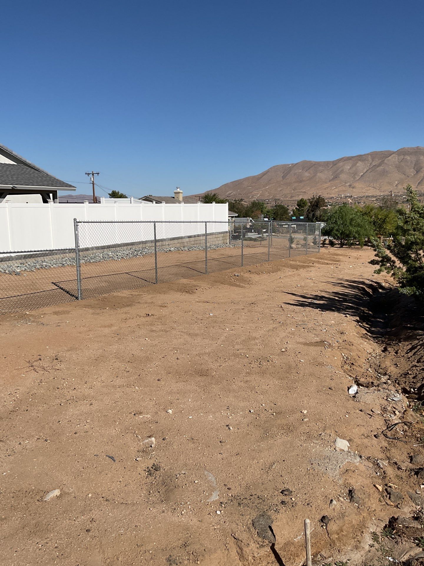 Fence Installation using chain -link by Fence Guys Inc.