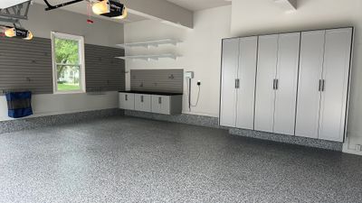 Julie H. upgraded her garage with our cabinets and wall storage options 