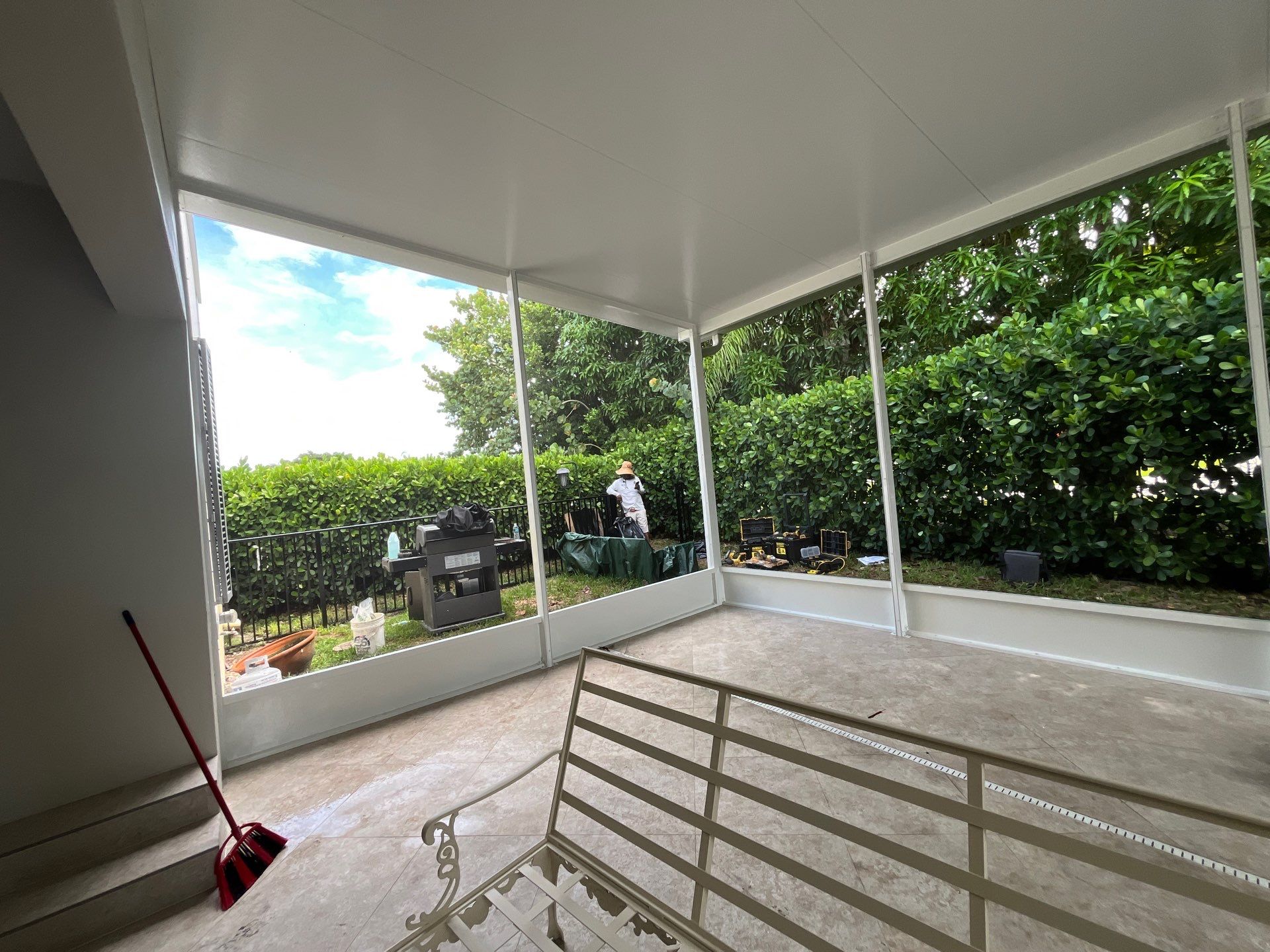Aluminum Insulated Roof and Screen Enclosure Installation in Atlantis by The Screen Depot, Inc