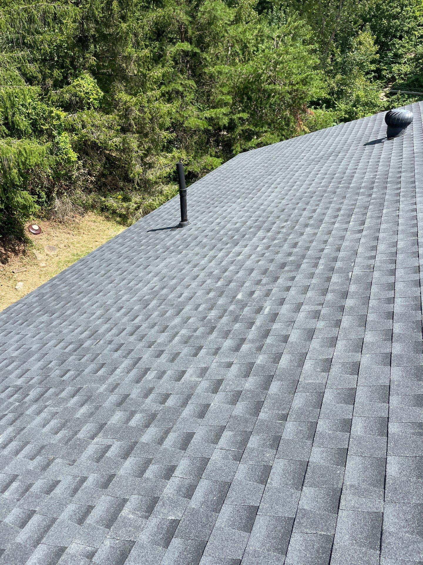Residential Roofing Installation using GAF Timberline HDZ Charcoal by Rainstoppers Roofing