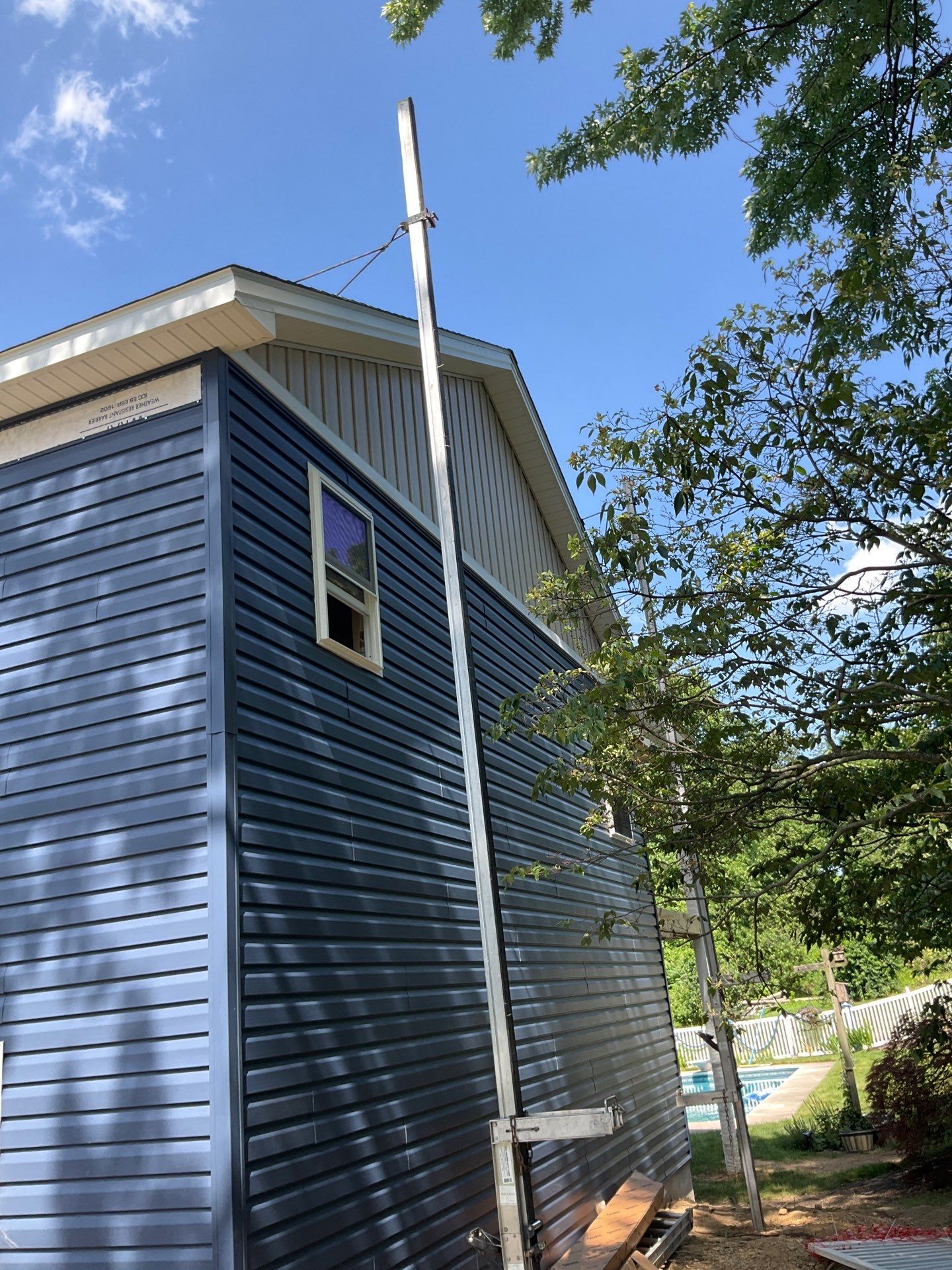 Two-Story Residential Addition and New Garage in Hummelstown by Esh Builders