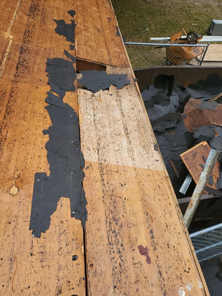 Residential Roofing Installation using Roof Replacement by American Roofing & Construction LLC