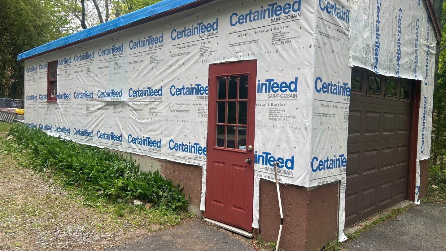 Siding Renewal with Cert. Monogram D/4 x 12'6" clapboard, Slate by DiGiorgi Roofing and Siding Inc