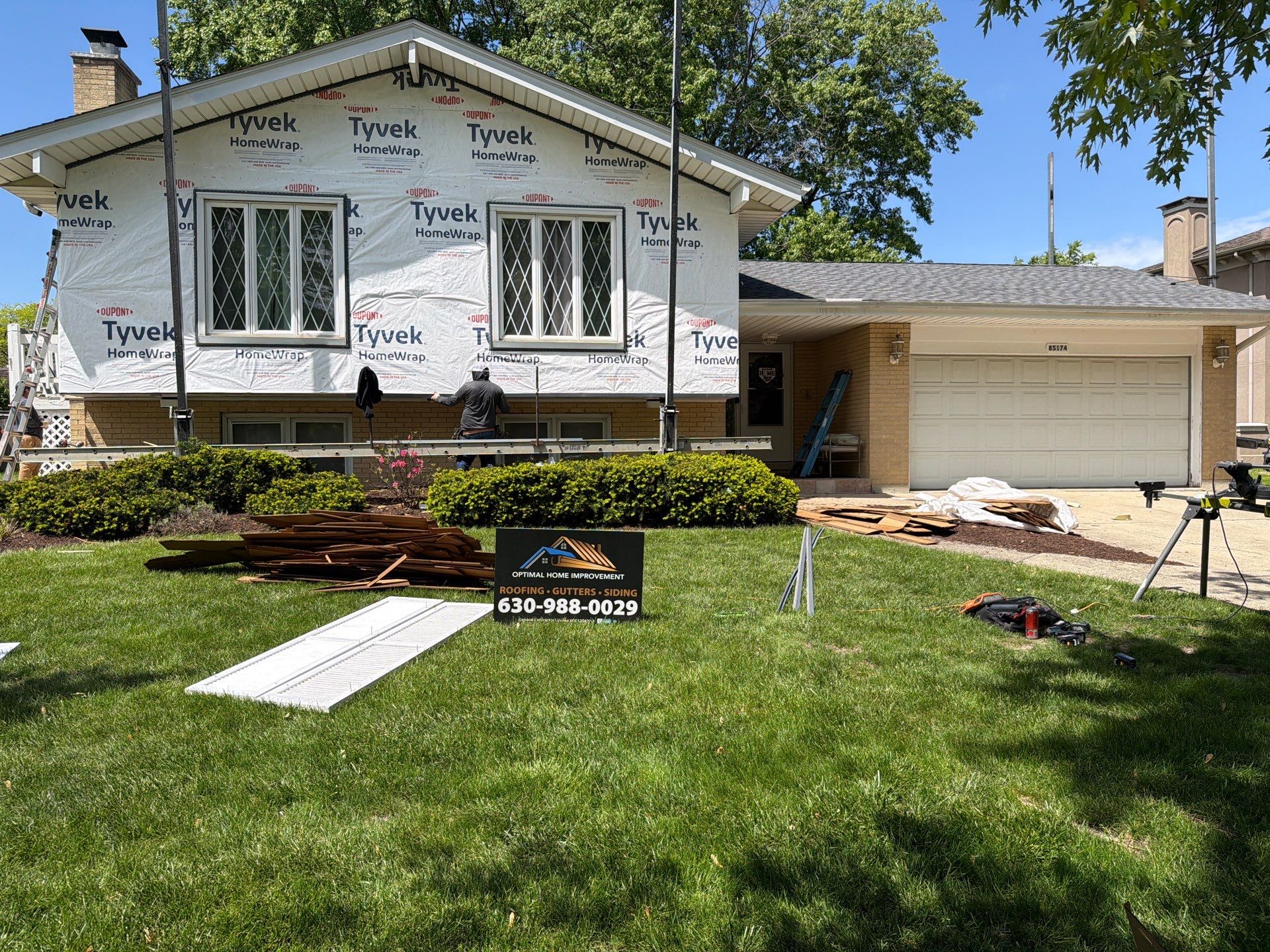 Roof replacement and chimney flashing by Optimal Home Improvement 