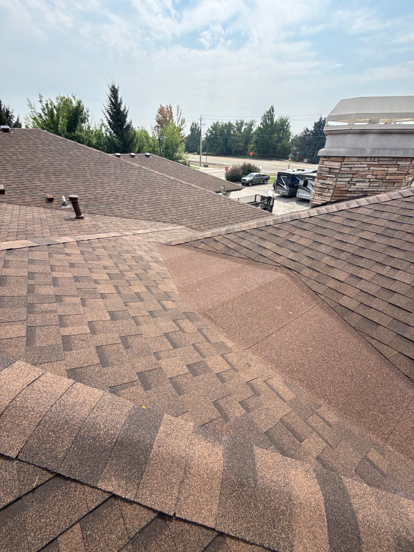 Boise Commercial Roof Replacement with Brown Architectural Shingles by Olive Roofing