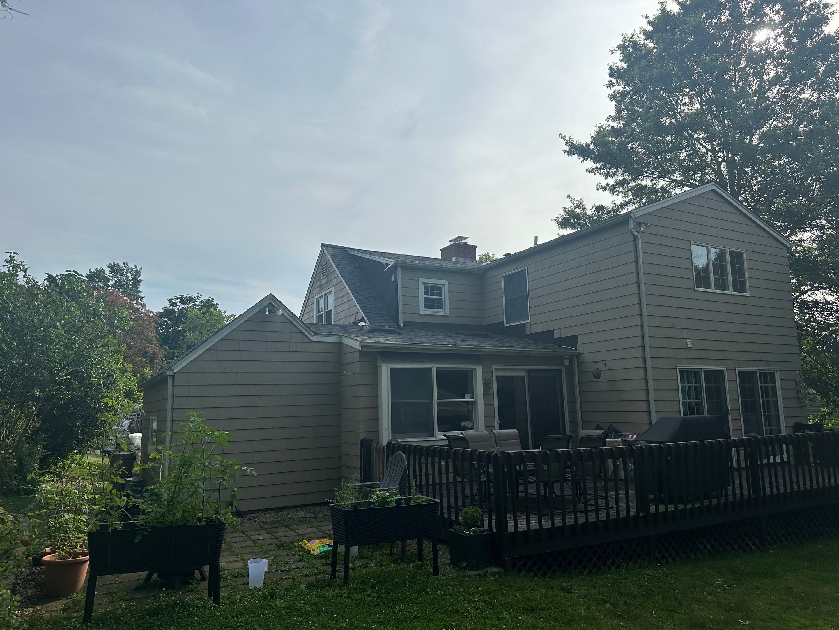 Complete Exterior Estate gray with Pacific Blue Siding by A Plus Exterior