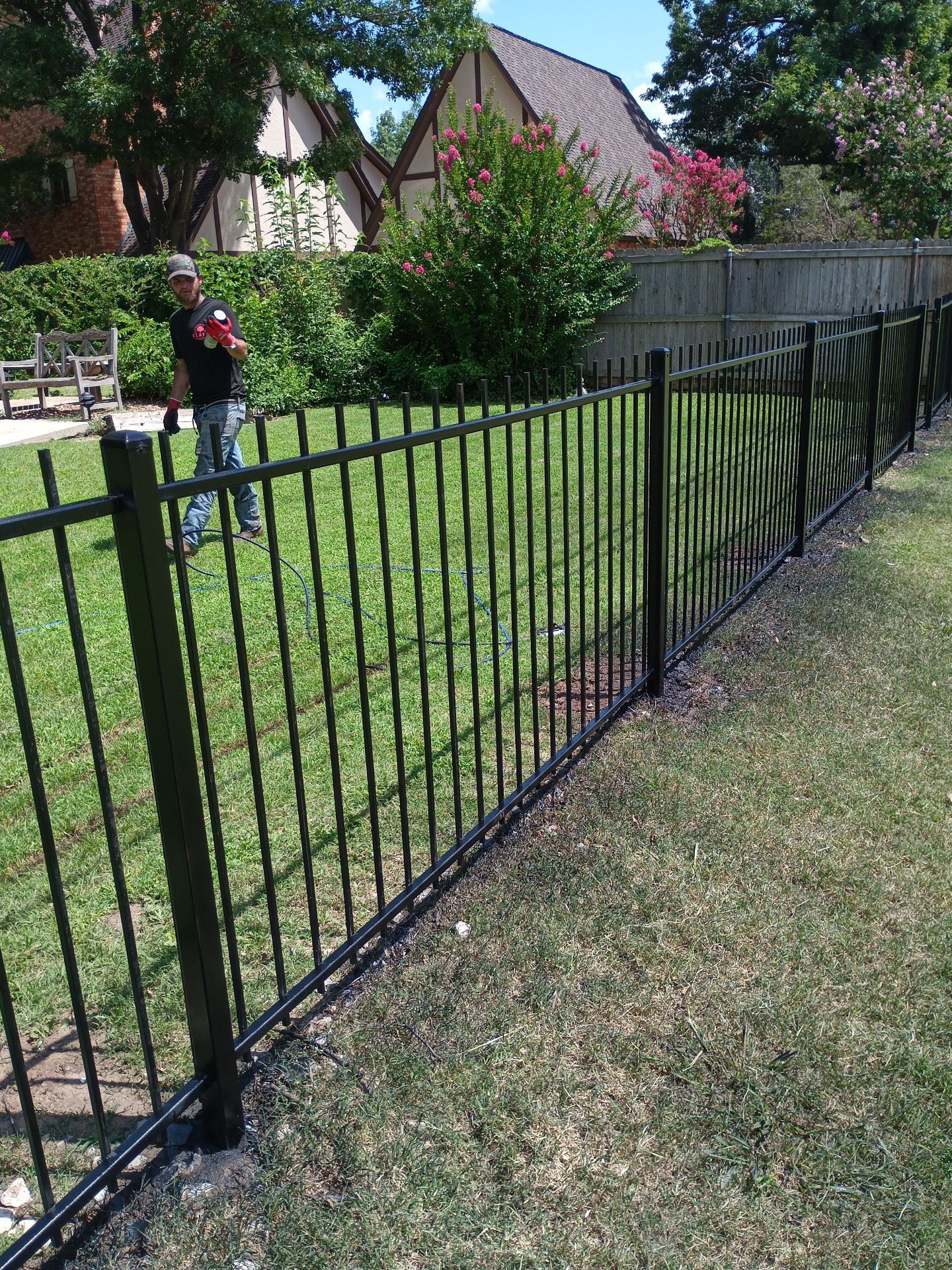 Custom Metal Fence Build by Clays Services Inc