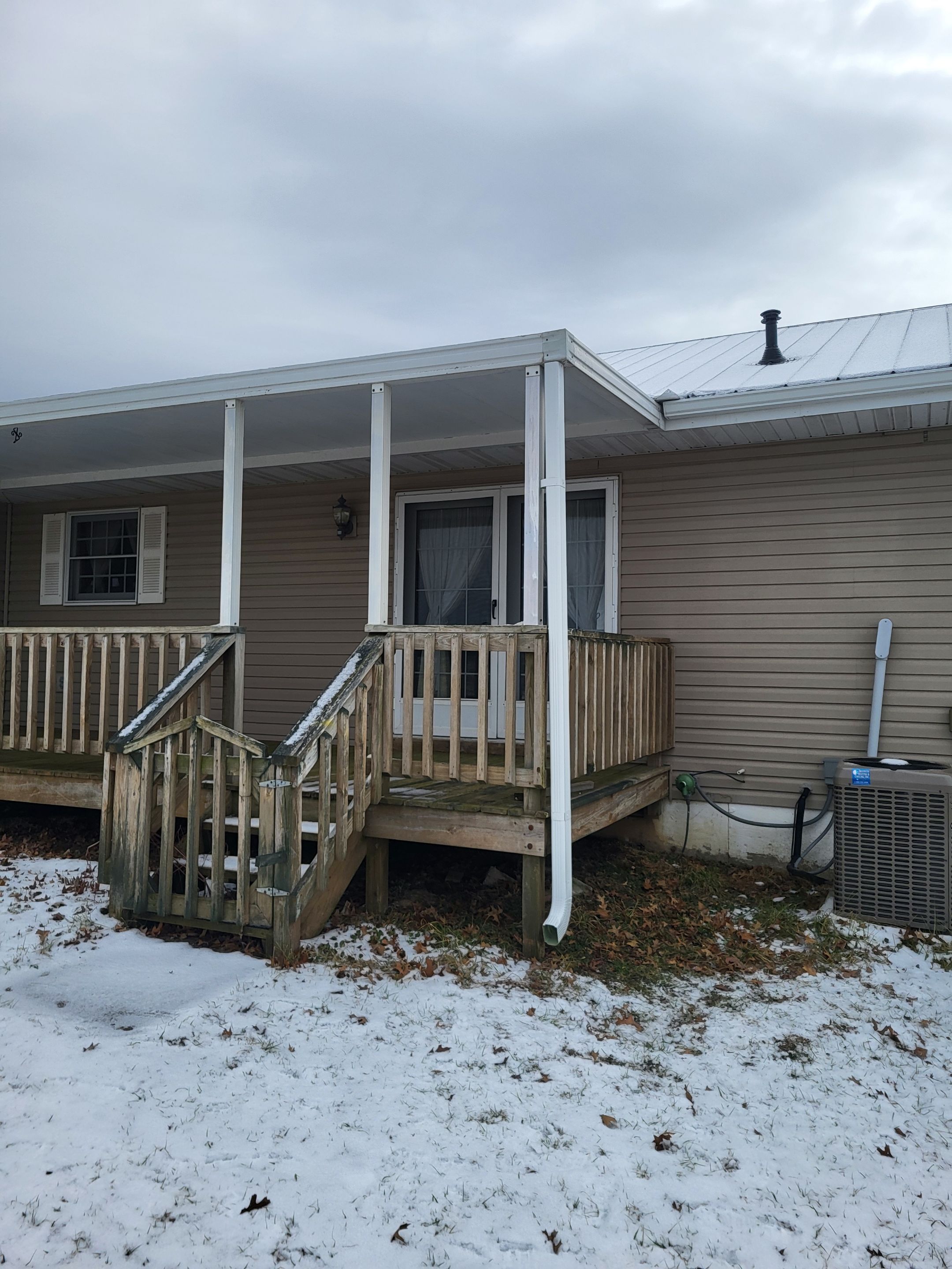 Residential 26 Gauge M-Rib Metal Roof + Gutters, Downspouts & Gutter Covers Install  by Titan Commercial & Residential Roofing 