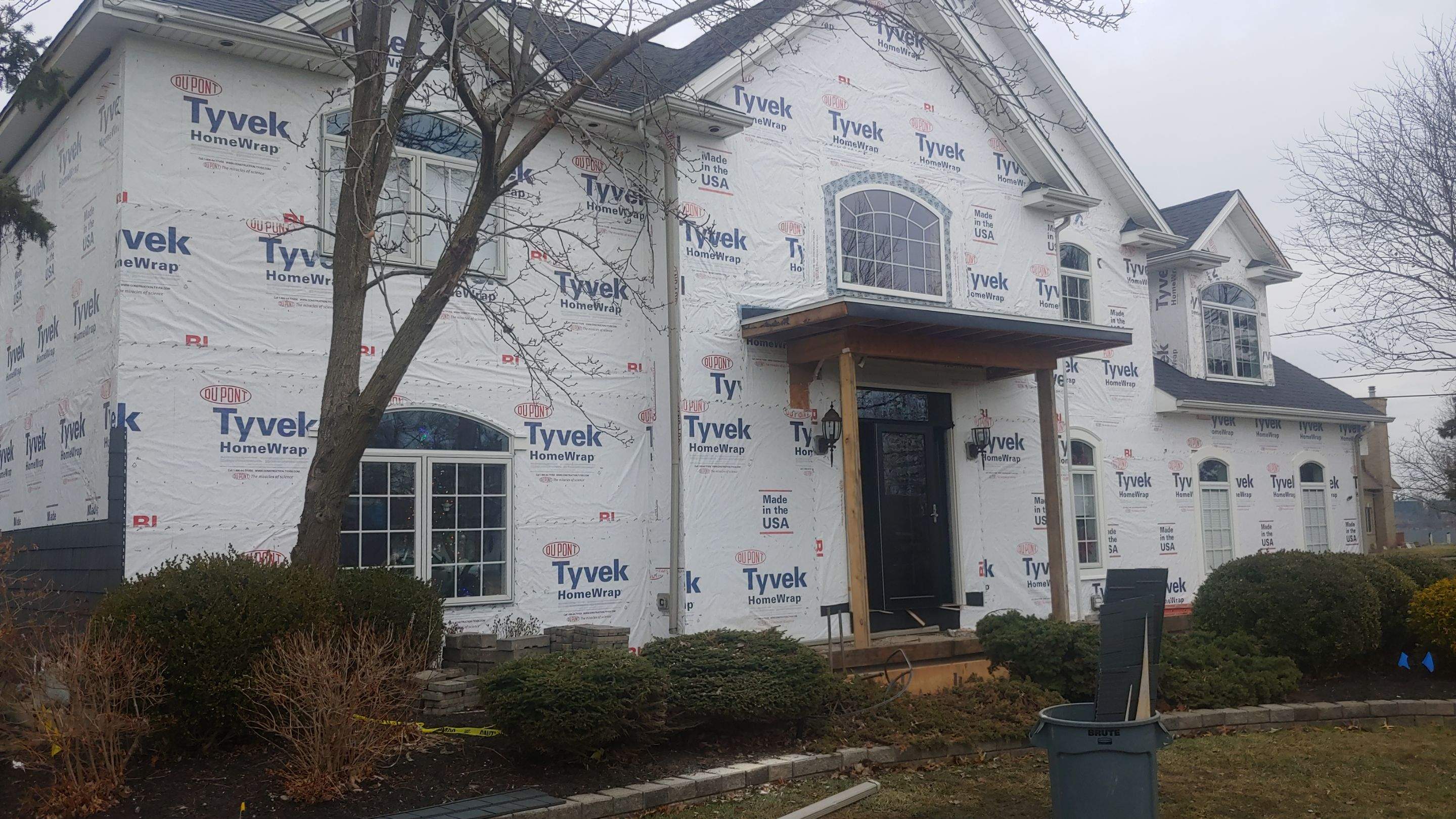 Exterior Renovations- Siding, Concrete, Railings, and Entry Door  by Ivy Lea Construction