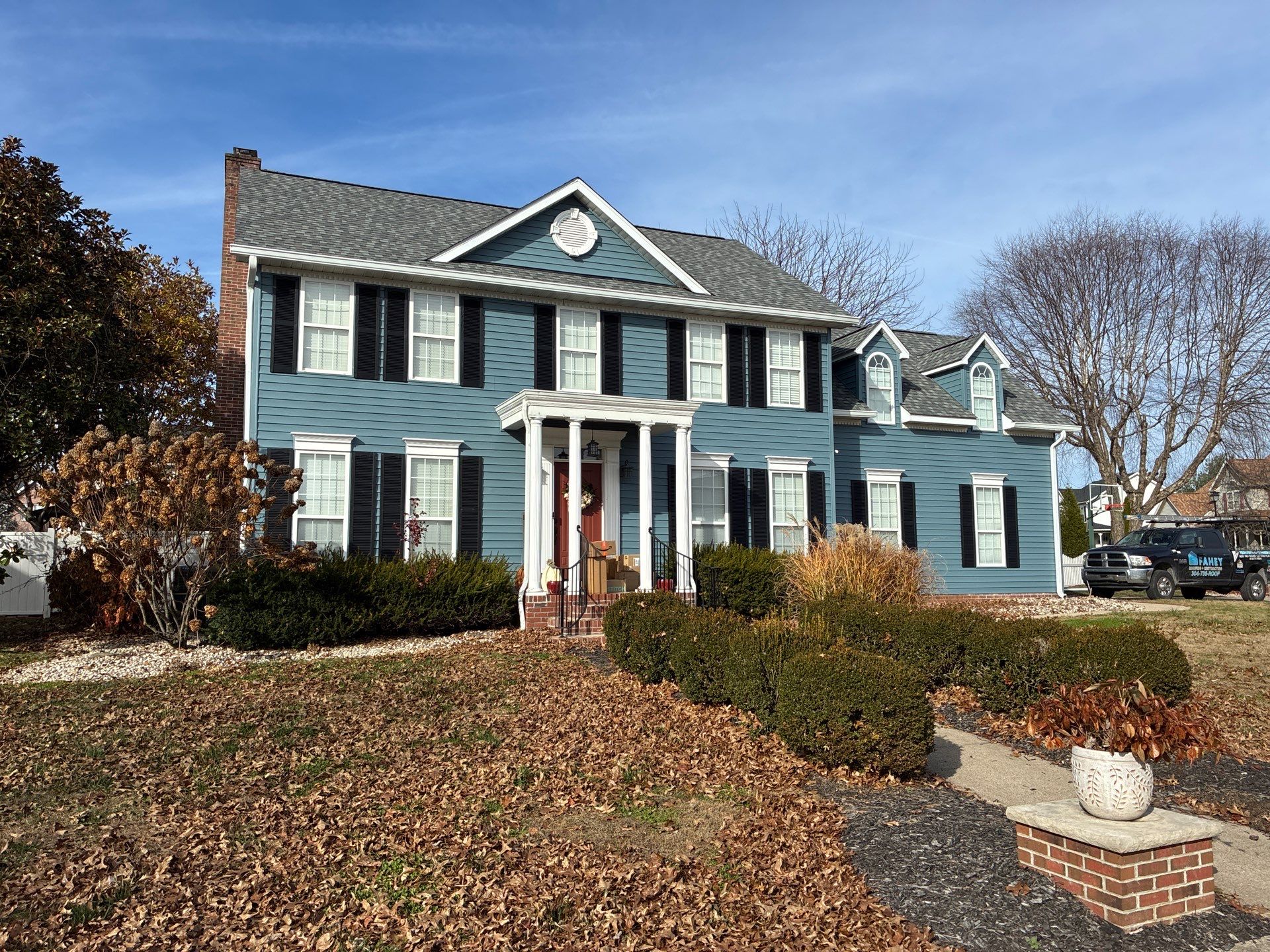 Landmark Pro, Siding, and 6" Gutters by Fahey Roofing + Contracting