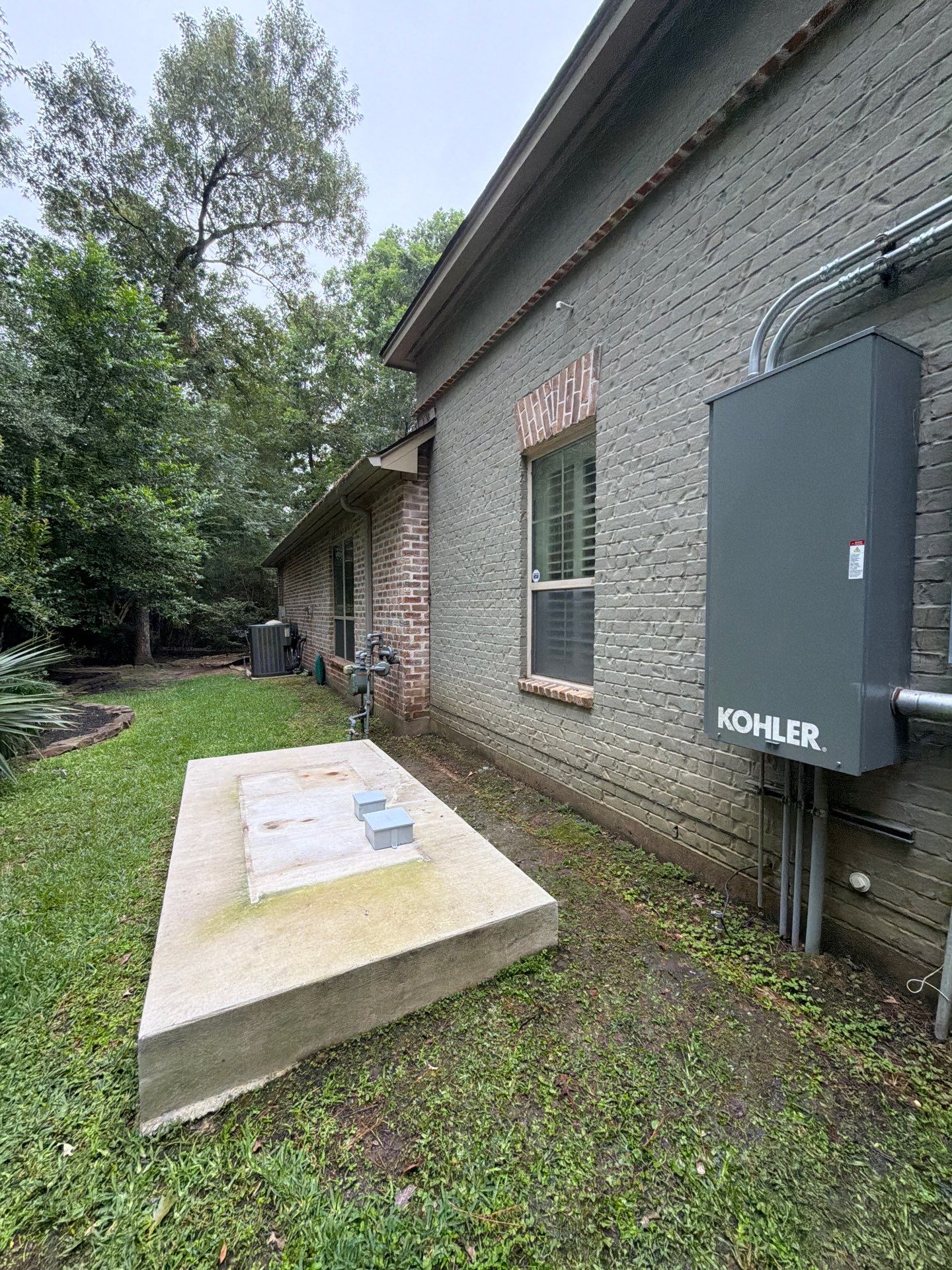 Turnkey KOHLER 30kW Standby Generator Relocation & Installation, The Woodlands, TX by GenTex Elite Services